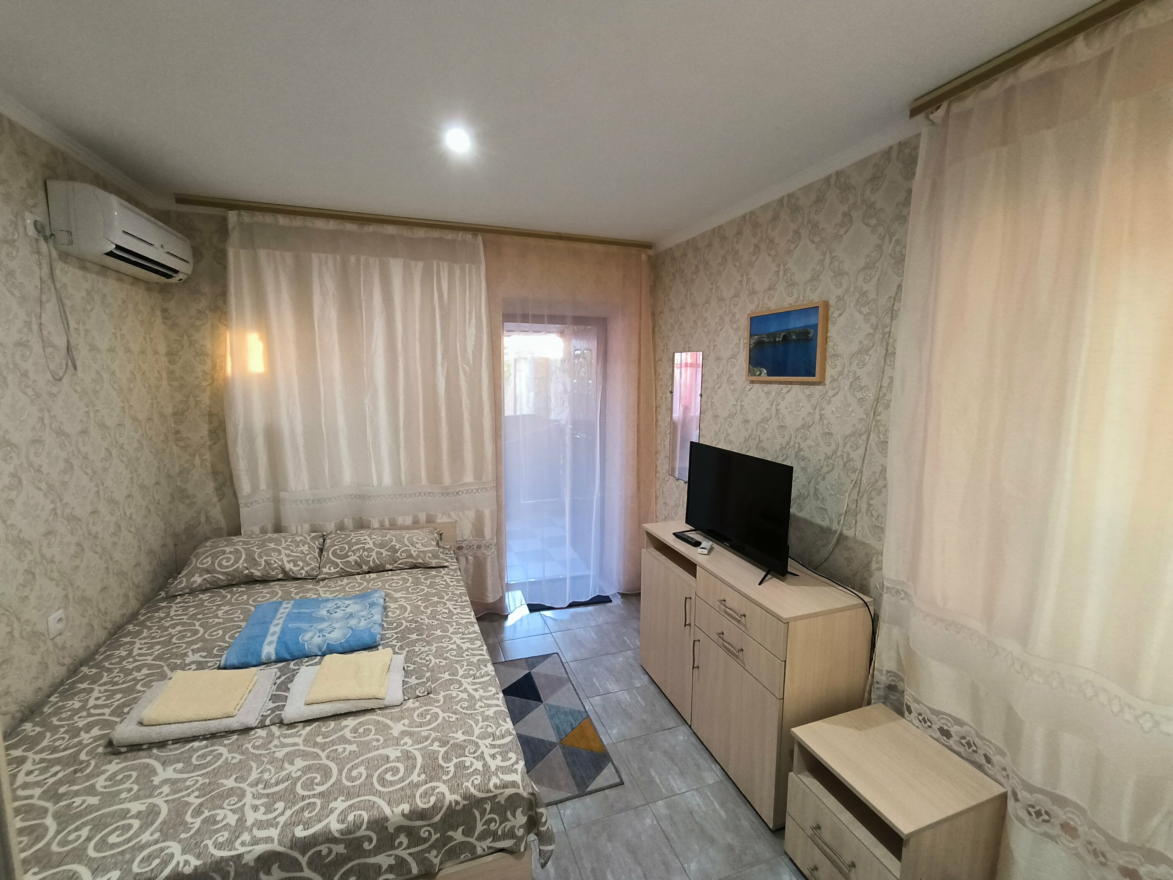 Трехместный номер с террасой