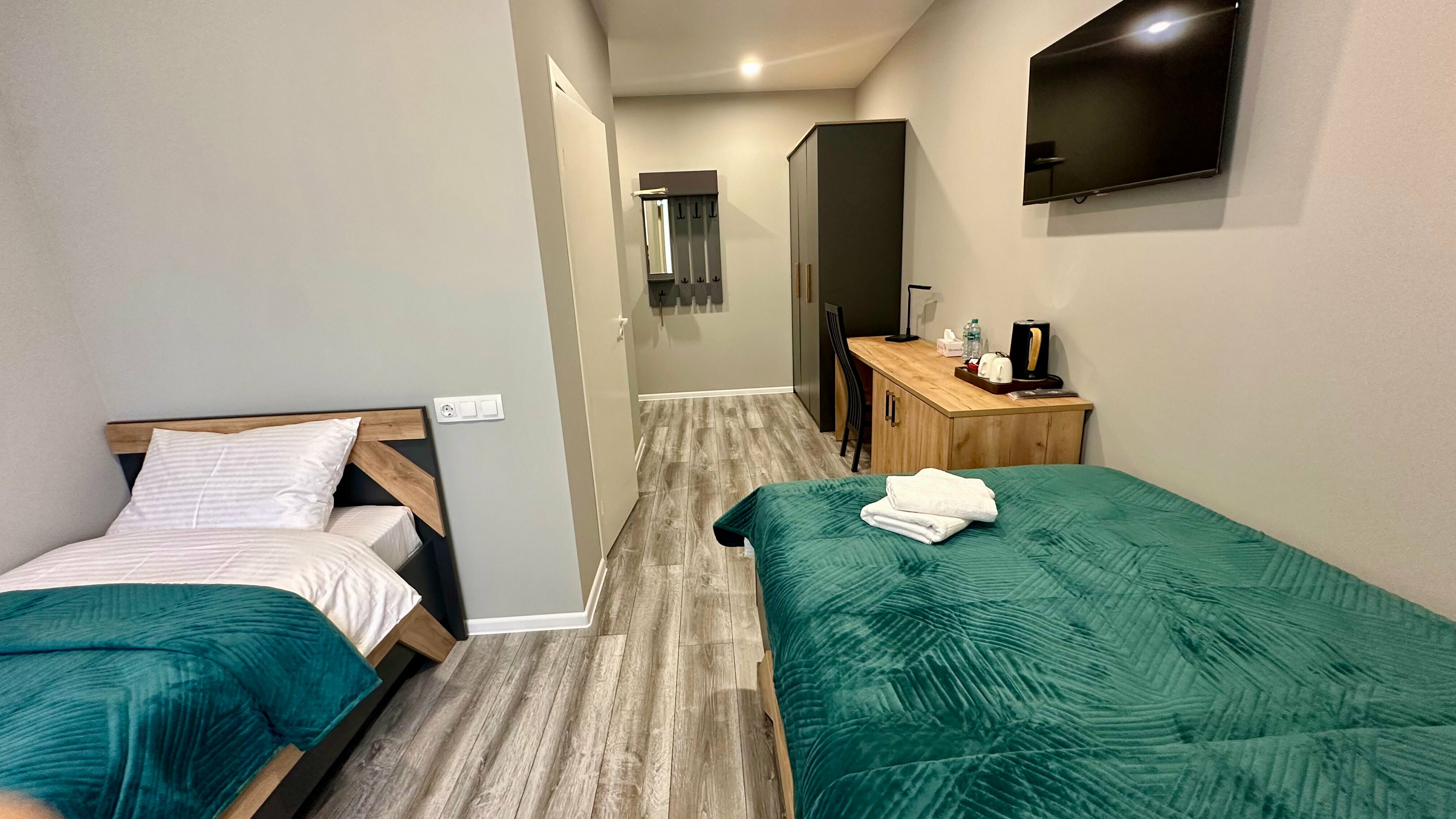 Двухместный номер с 2 отдельными кроватями и душем