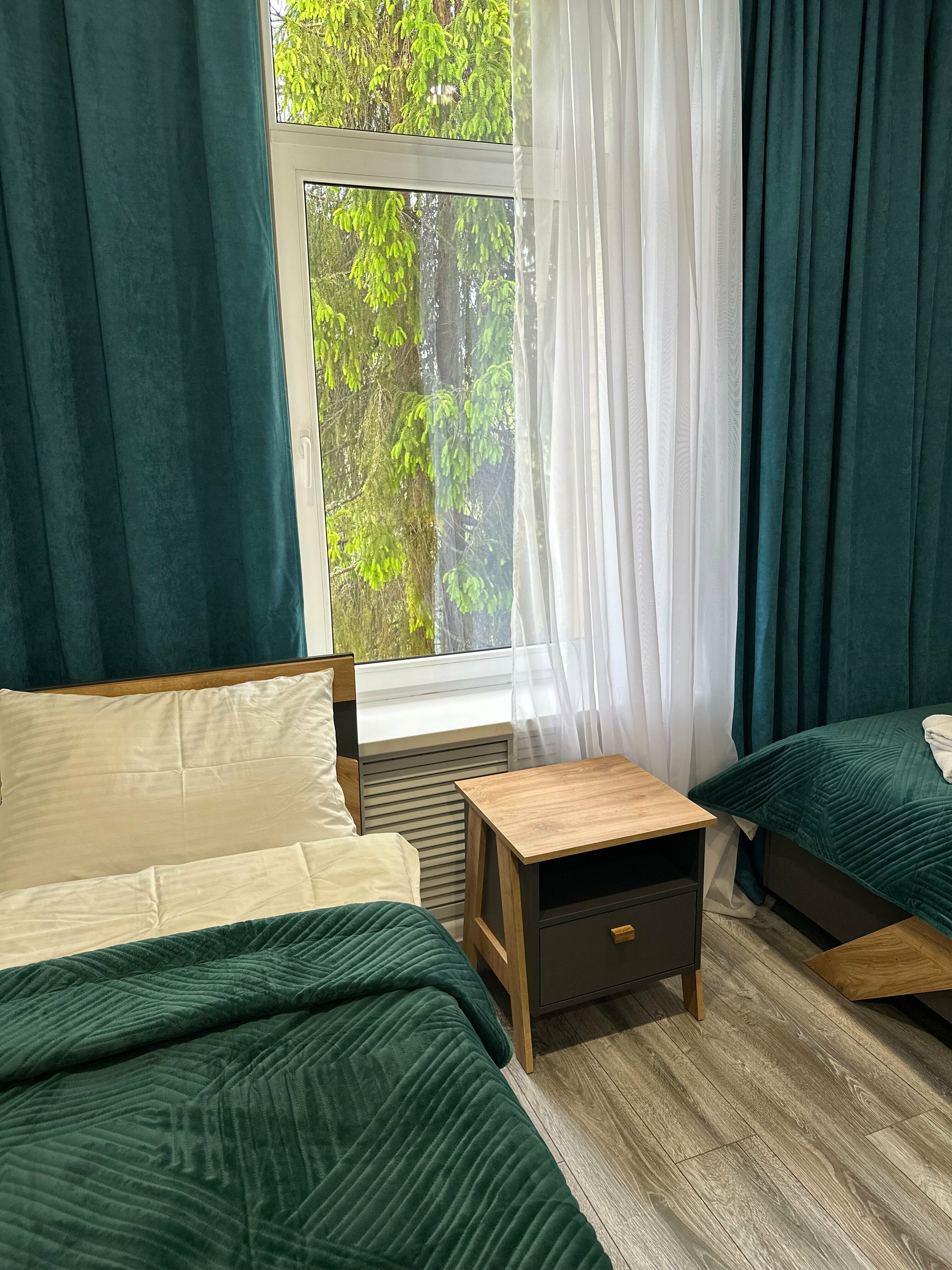 Двухместный номер с 2 отдельными кроватями и душем