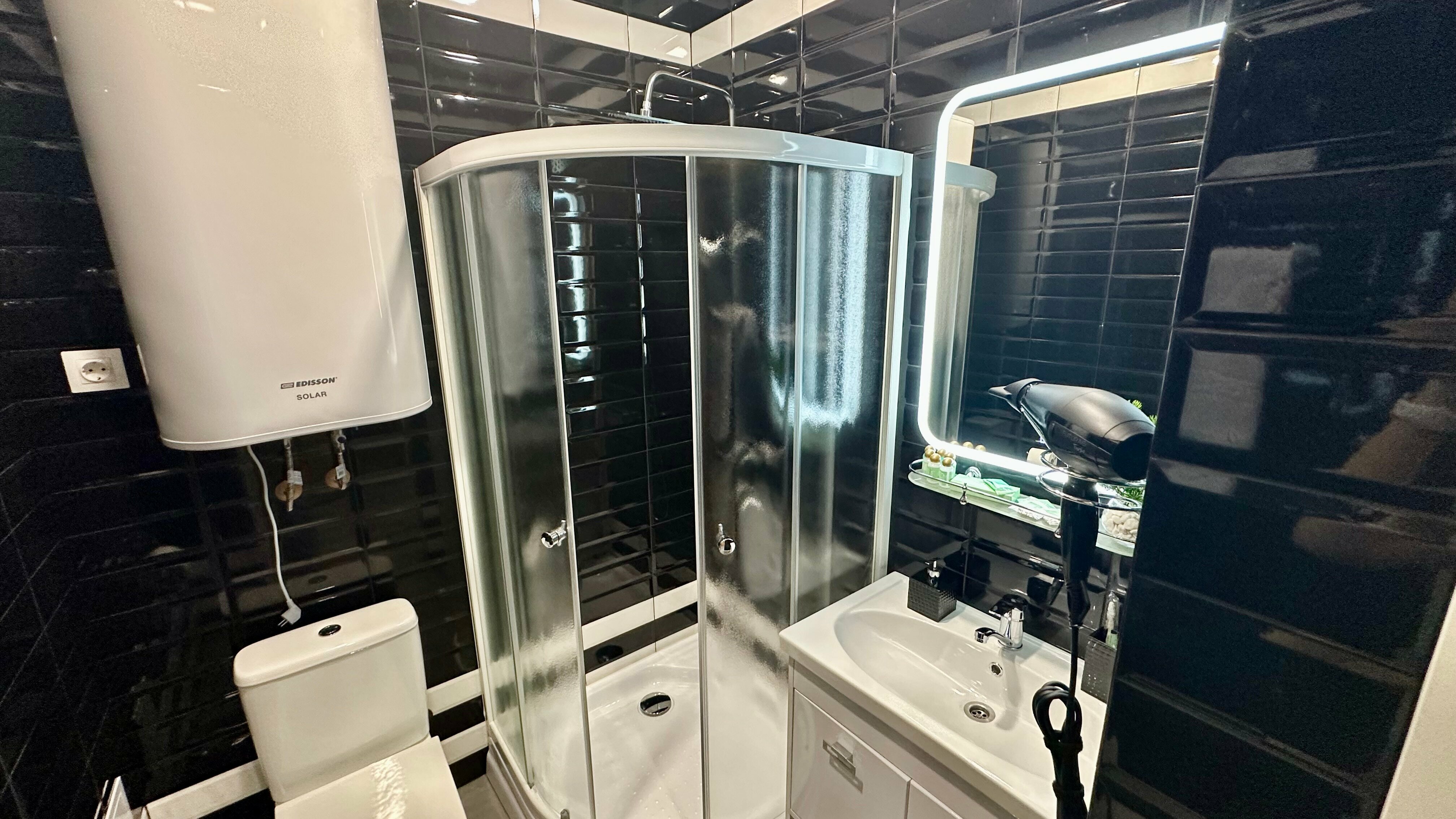 Двухместный номер с 2 отдельными кроватями и душем