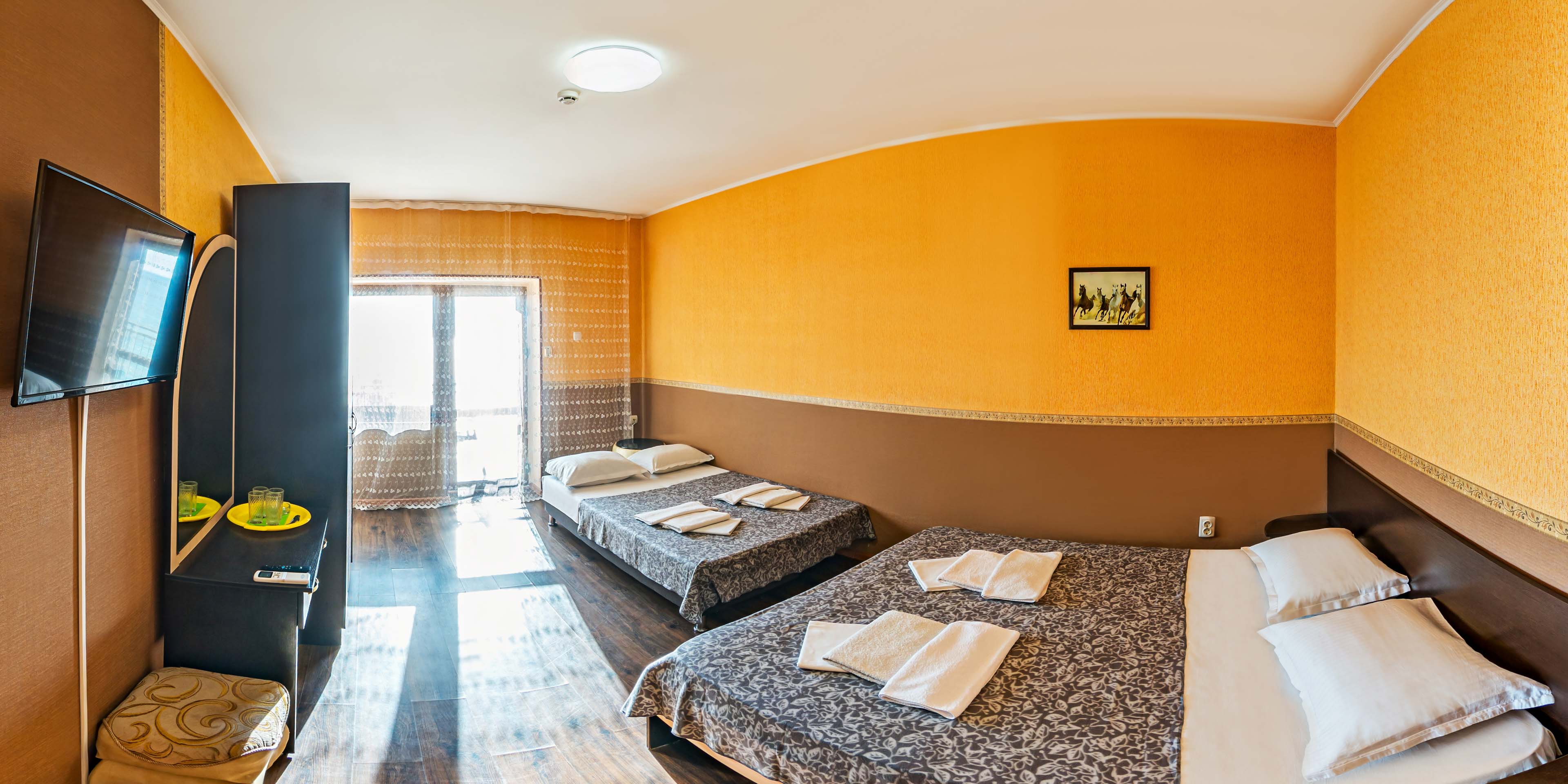 Четырехместный номер с балконом