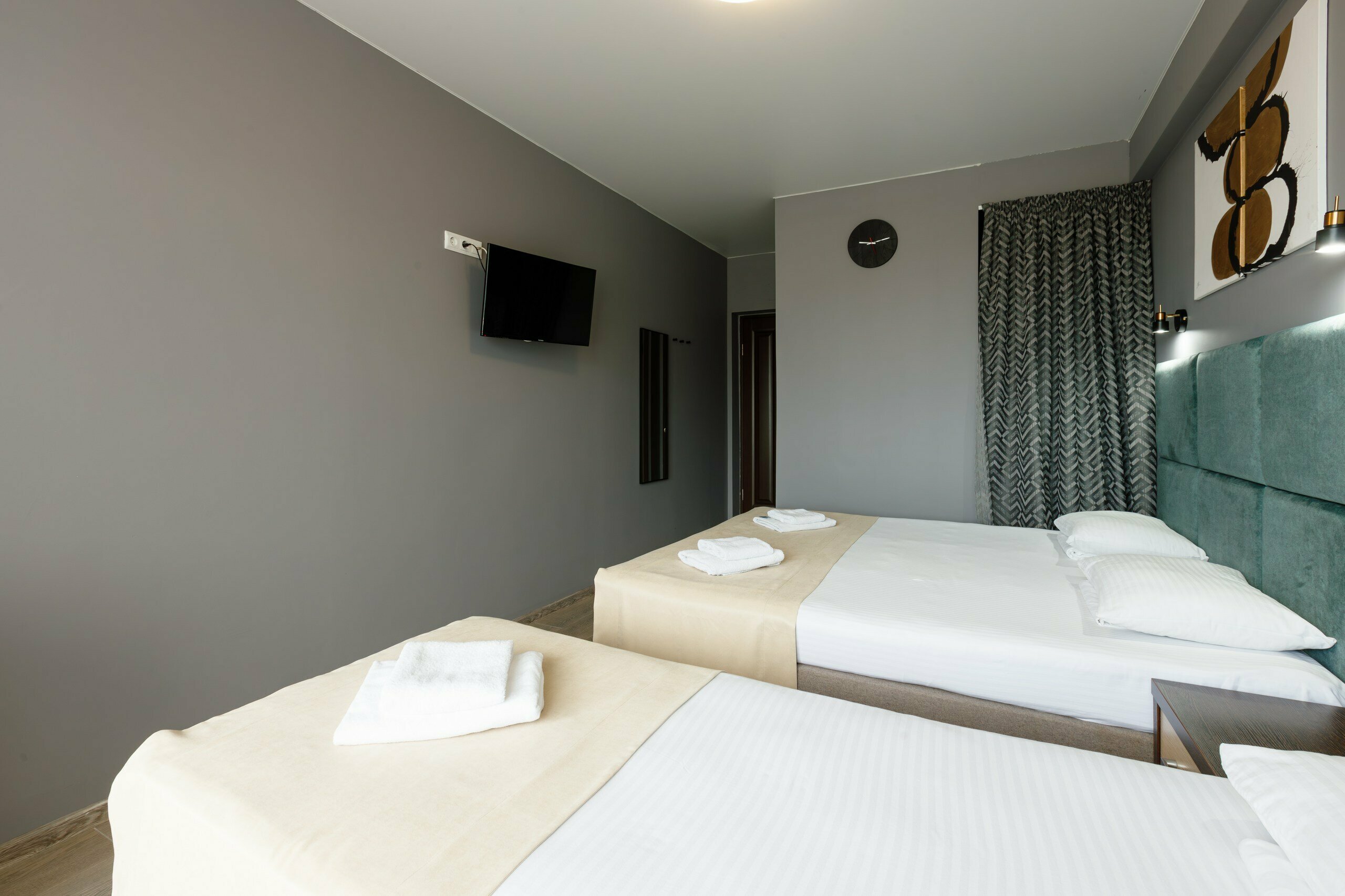 Трехместный номер Делюкс