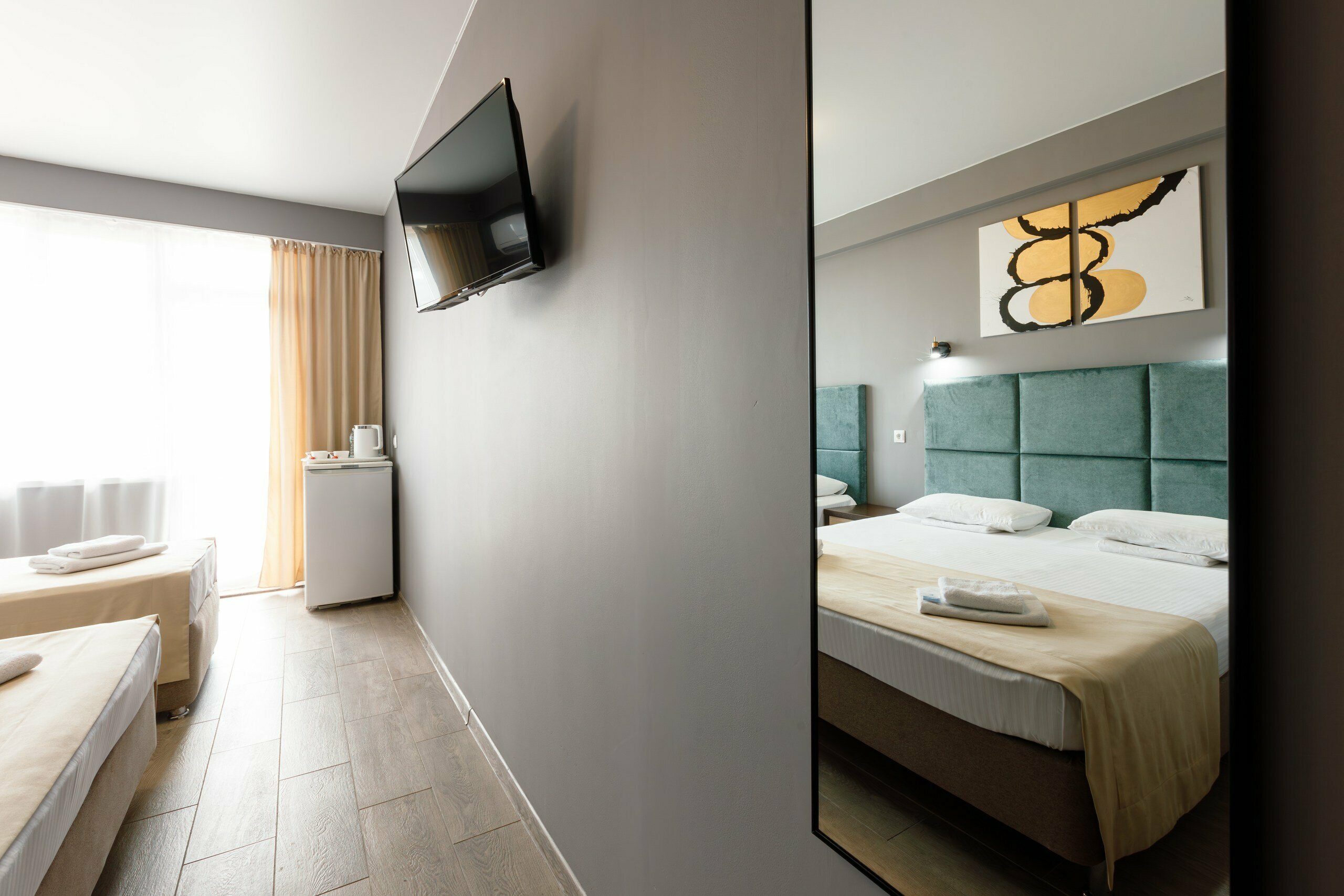 Трехместный номер Делюкс