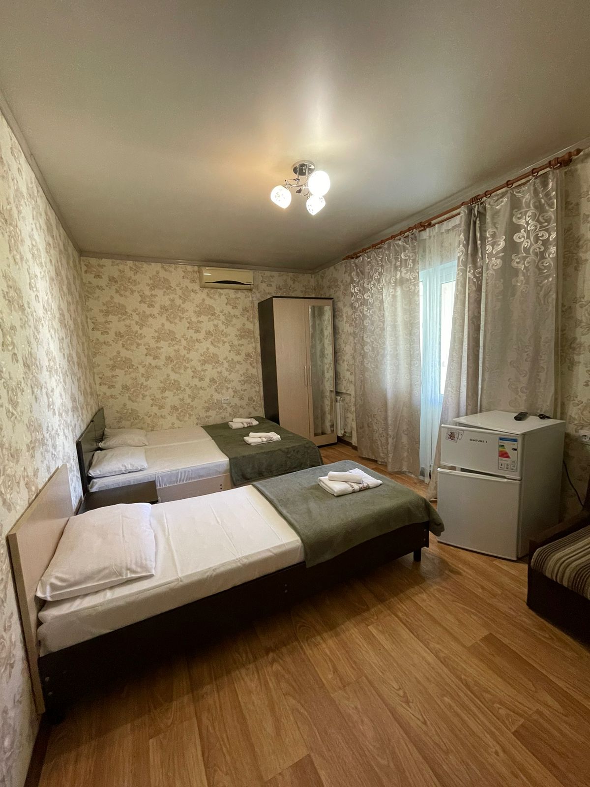 Четырехместный номер с балконом