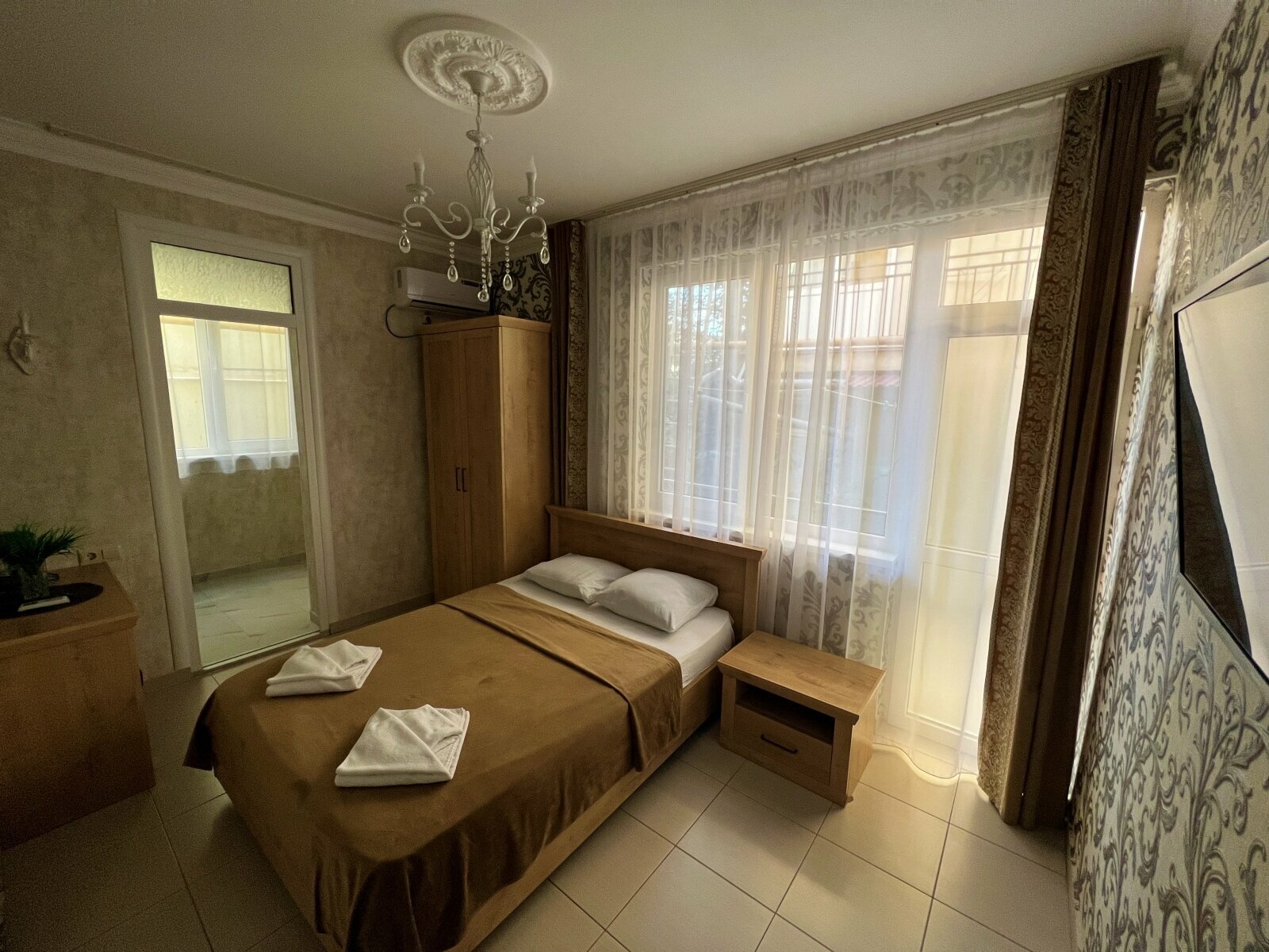 Трехместный номер с балконом