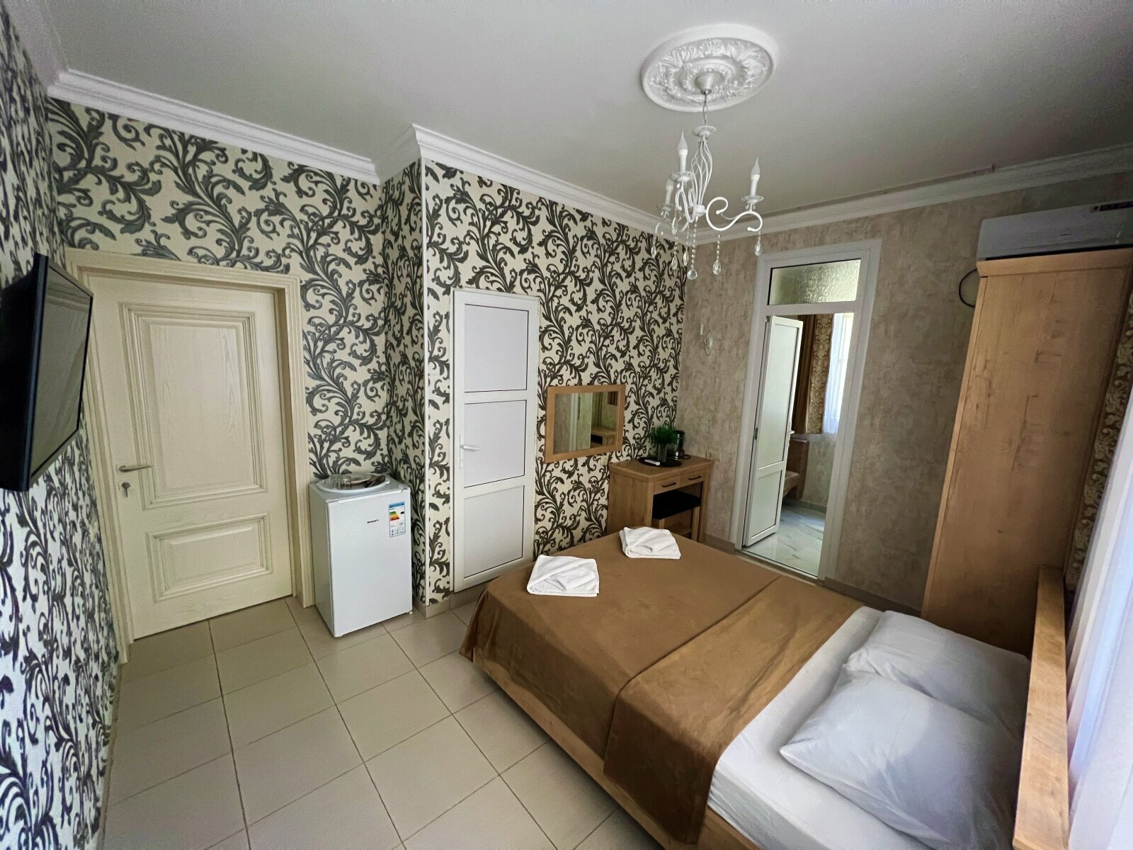 Трехместный номер с балконом