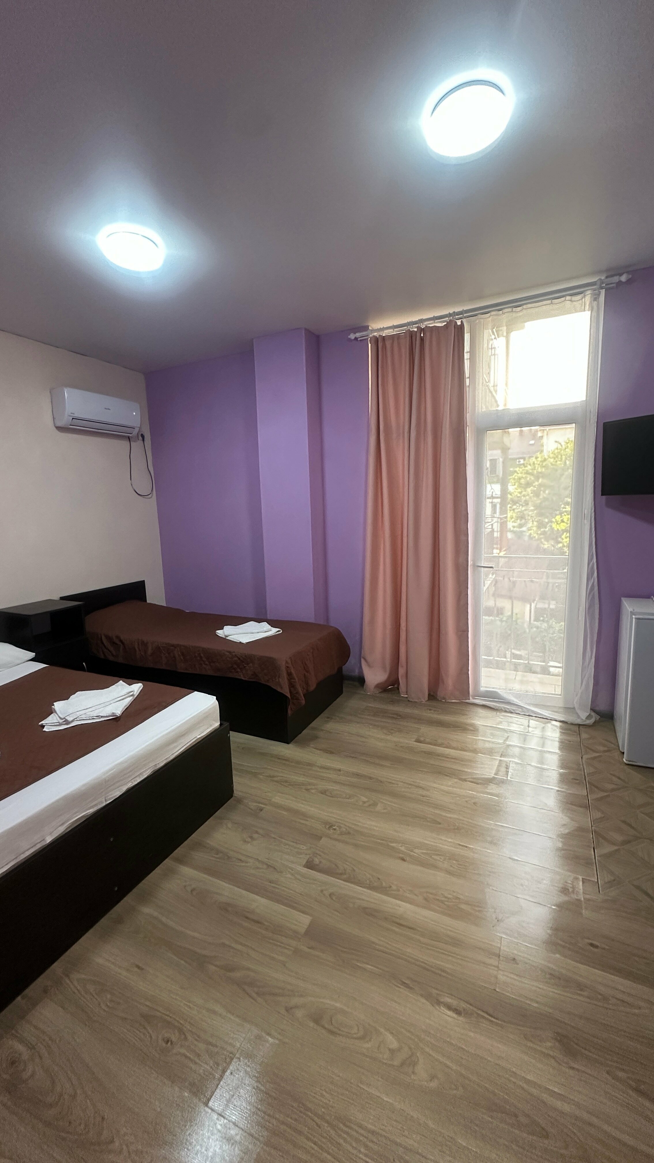 Трехместный номер с балконом