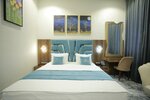 Номер делюкс с 1 двуспальной кроватью в MaxWell Hotel & SPA