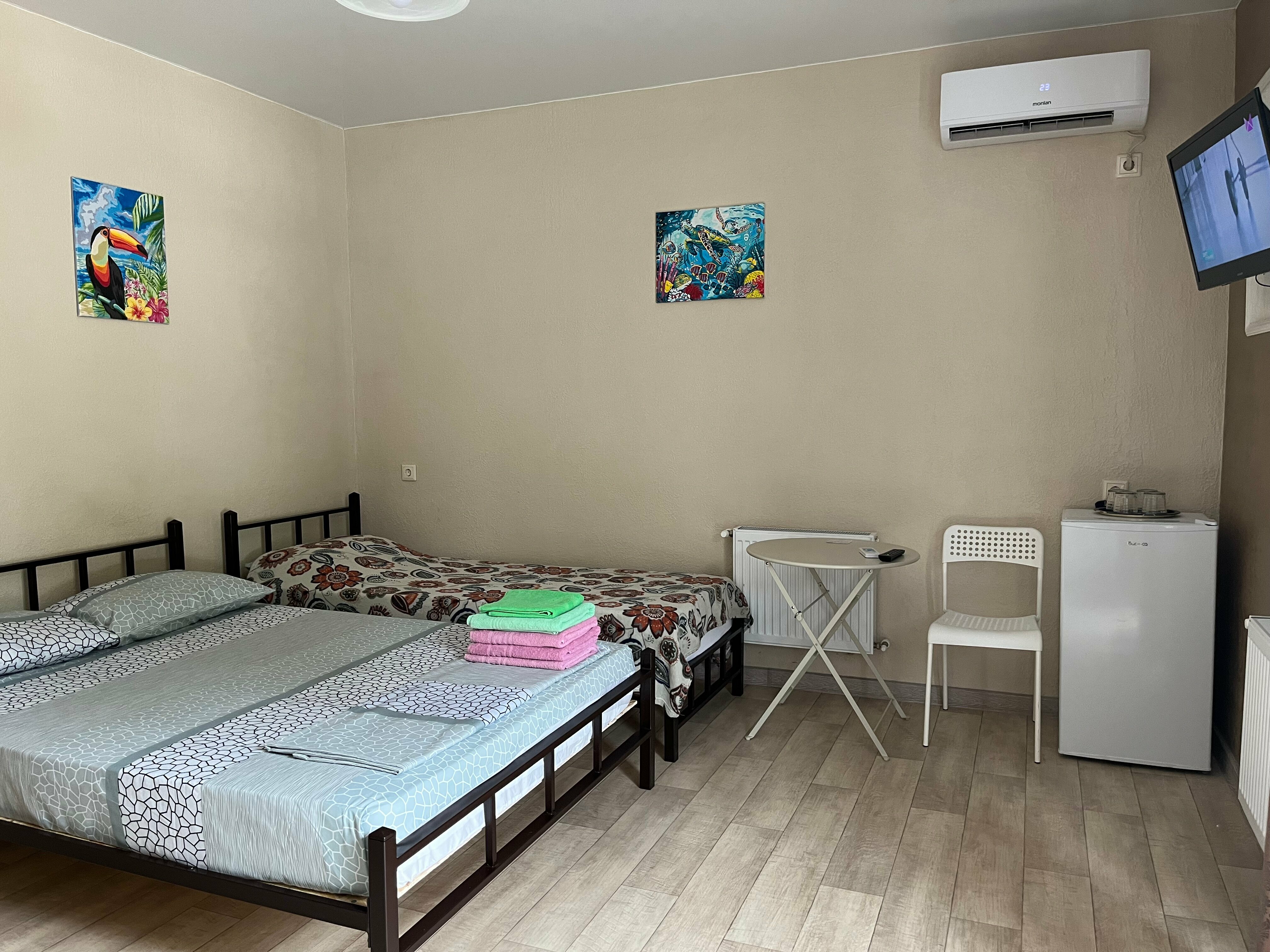 Улучшенный четырехместный номер