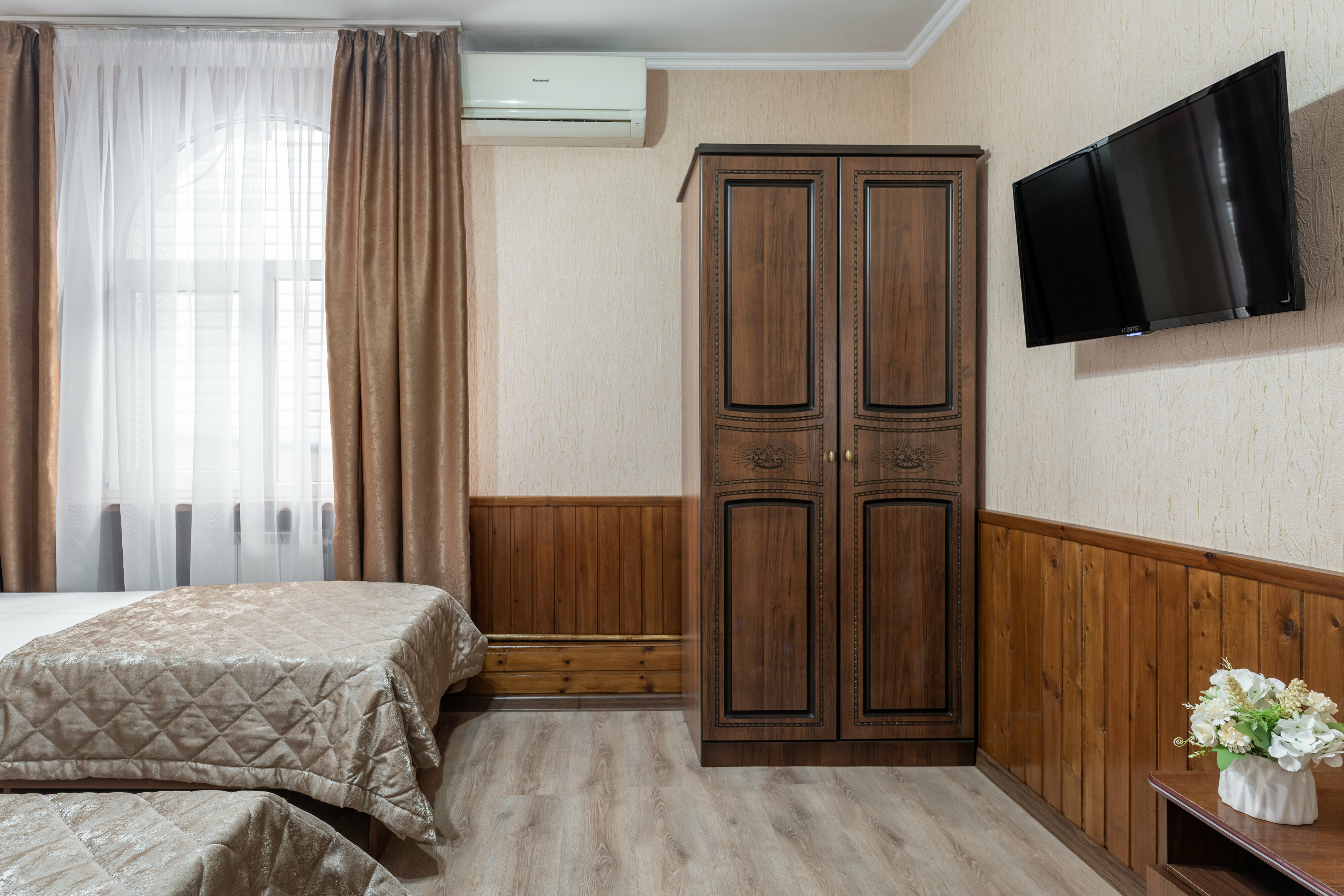 Трехместный номер с общей ванной комнатой