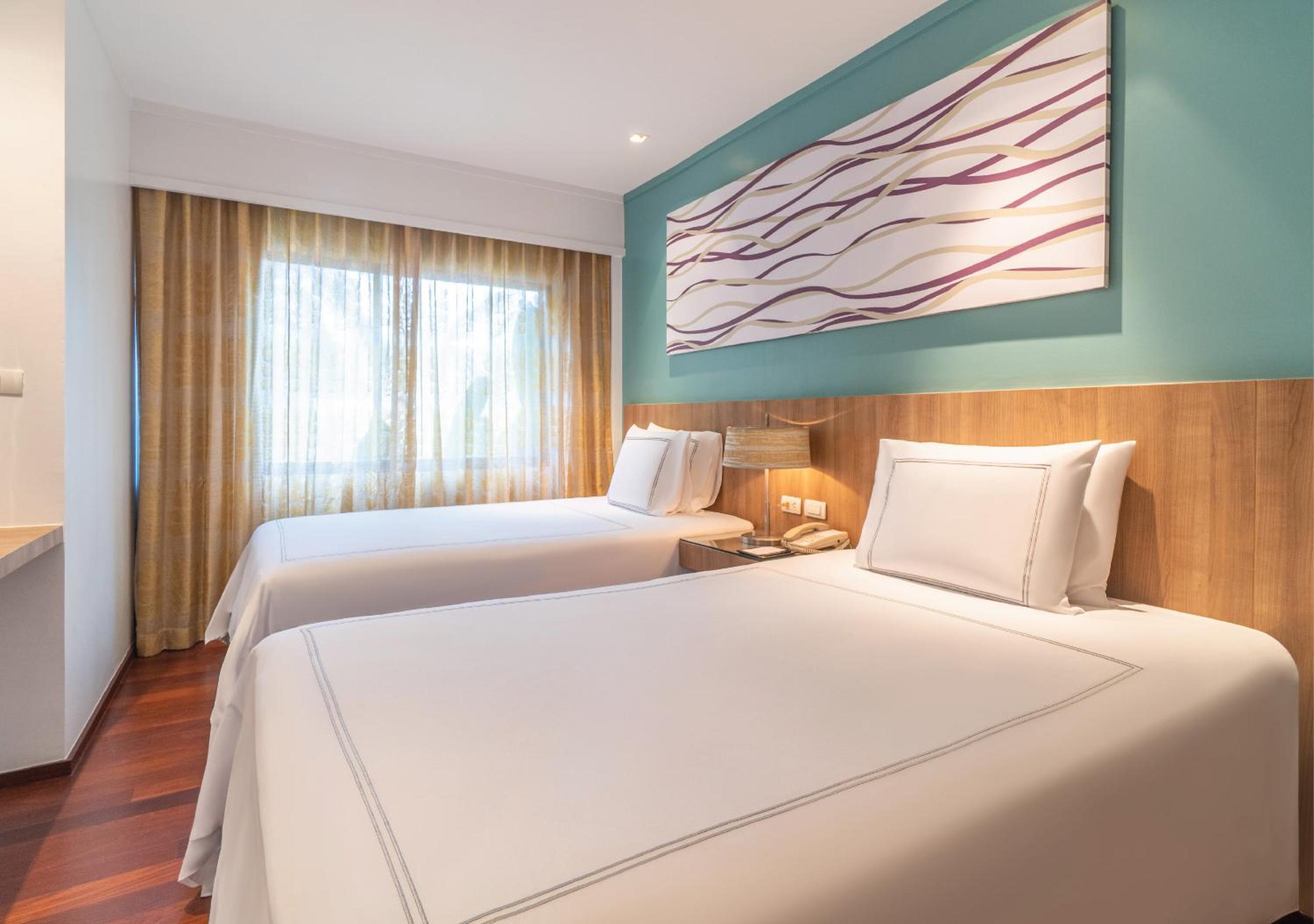 Two-Bedroom Suite with Terrace and Pool View