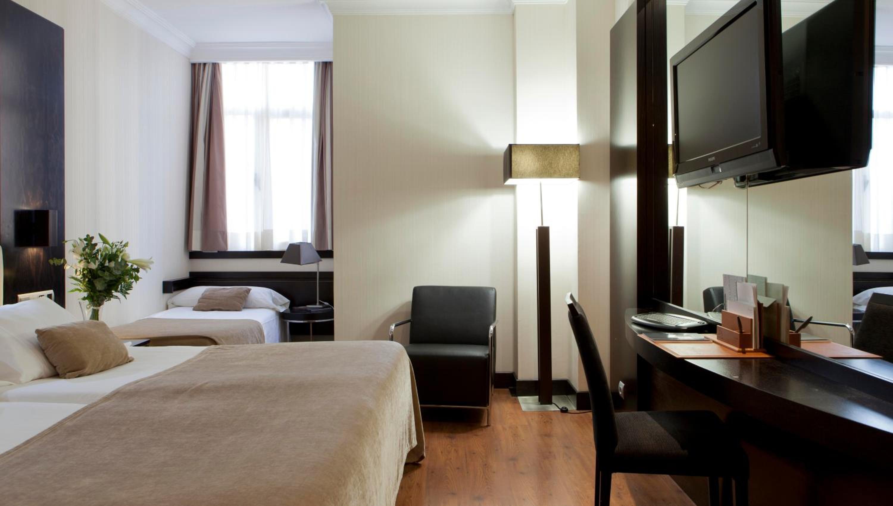 Triple Room (2 Adults + 1 Child)