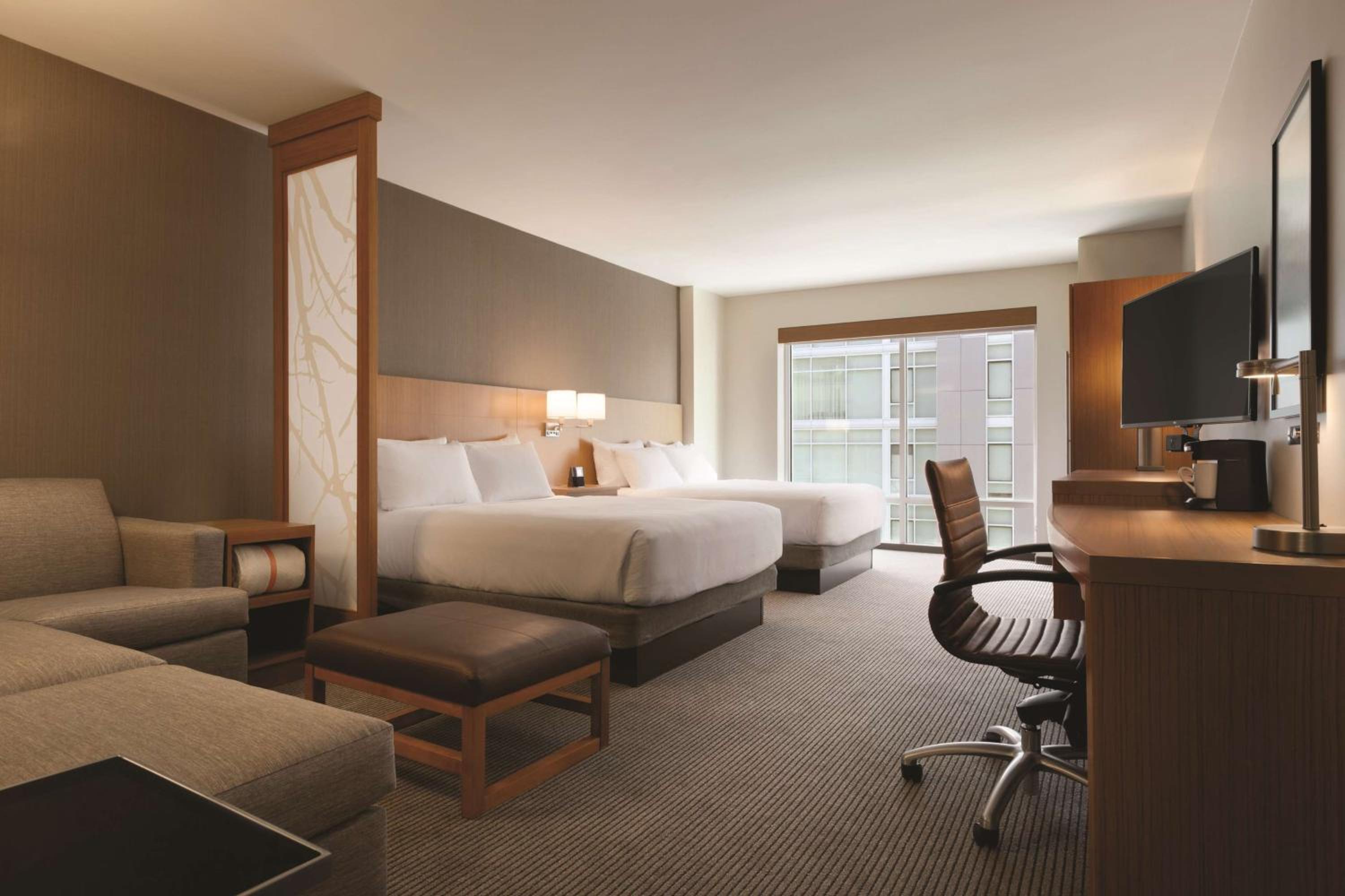 Queen Room with Two Queen Beds and Sofa Bed