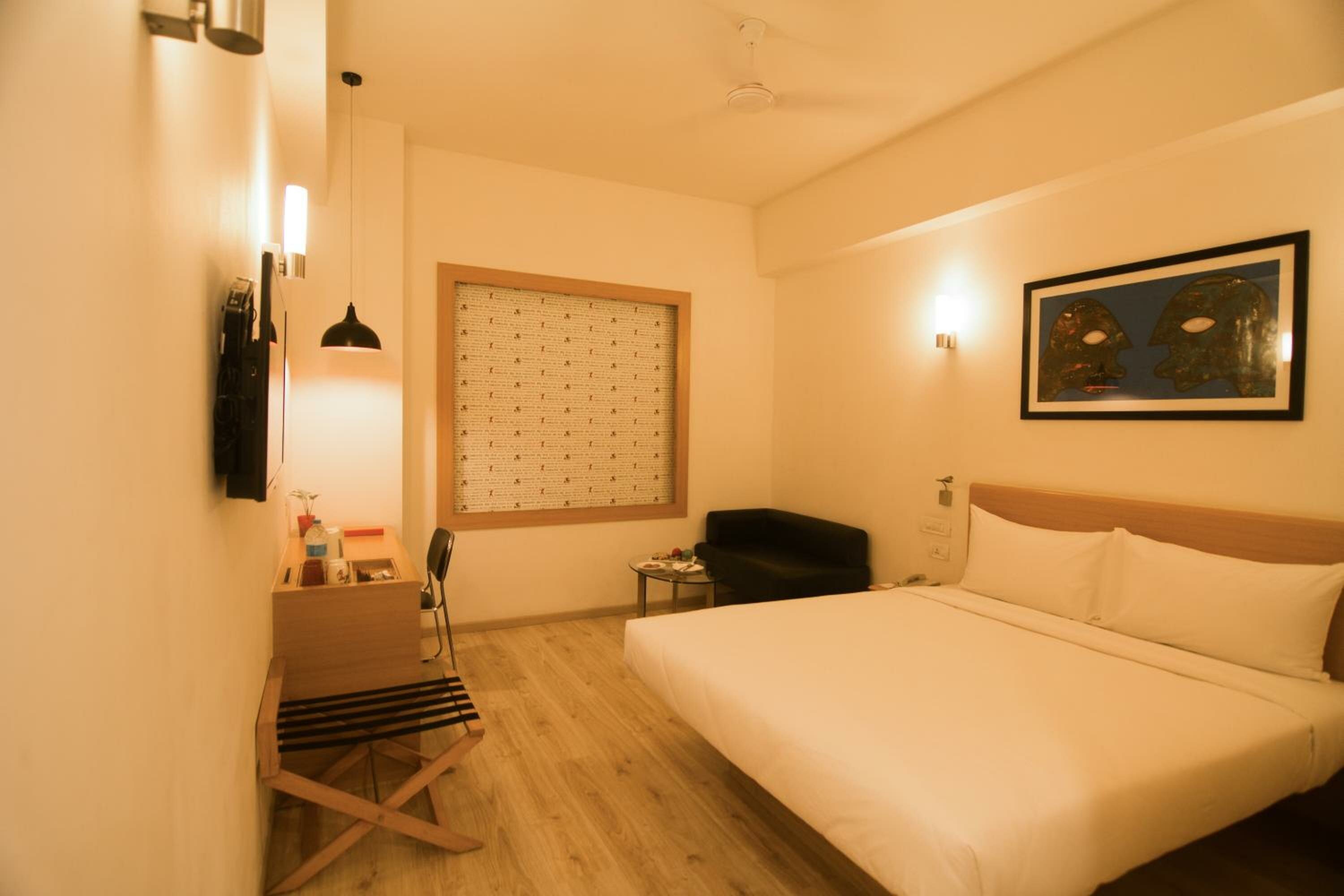 Business Double Room (Happy Hours 1 + 1 IMFL (Select Brands),Complimentary Laundry service for upto 2 clothing item(s) ,Complimentary Welcome Drink on arrival ,Early Check-In upto 2 hours (subject to availability) Late Check-Out upto 2 hours