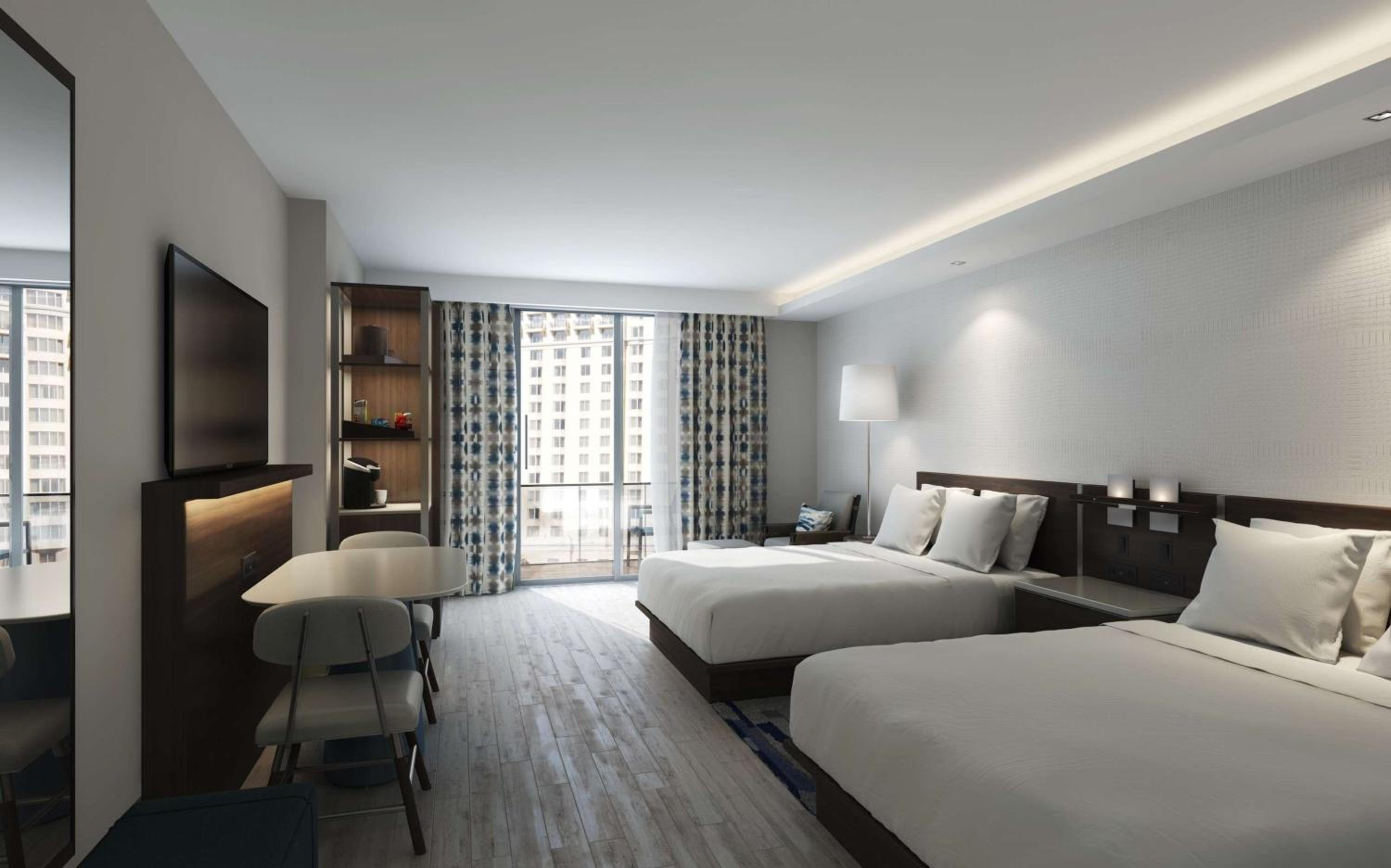 Deluxe Queen Room with Two Queen Beds and Balcony