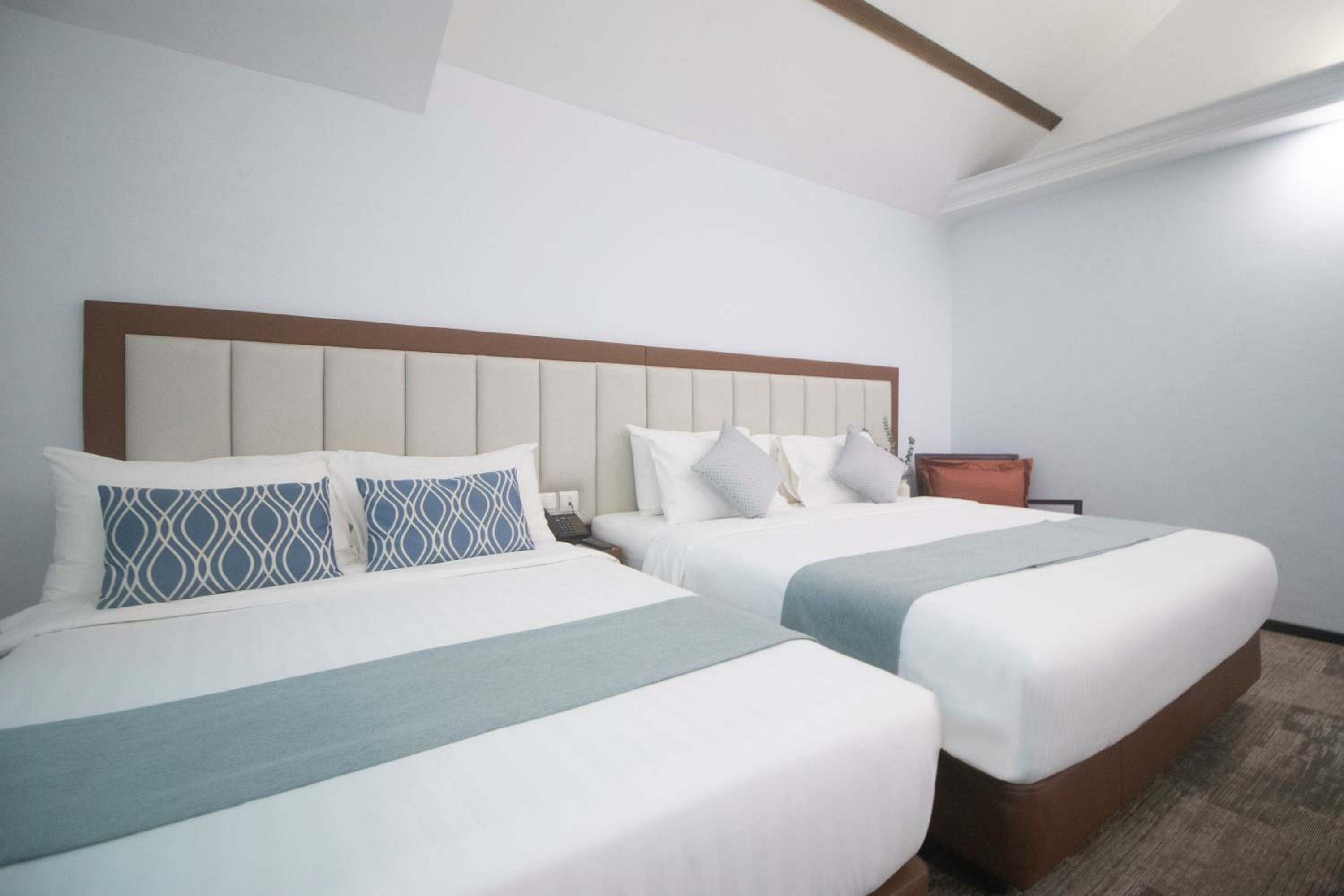 Quad Room with Skylight & Bathtub