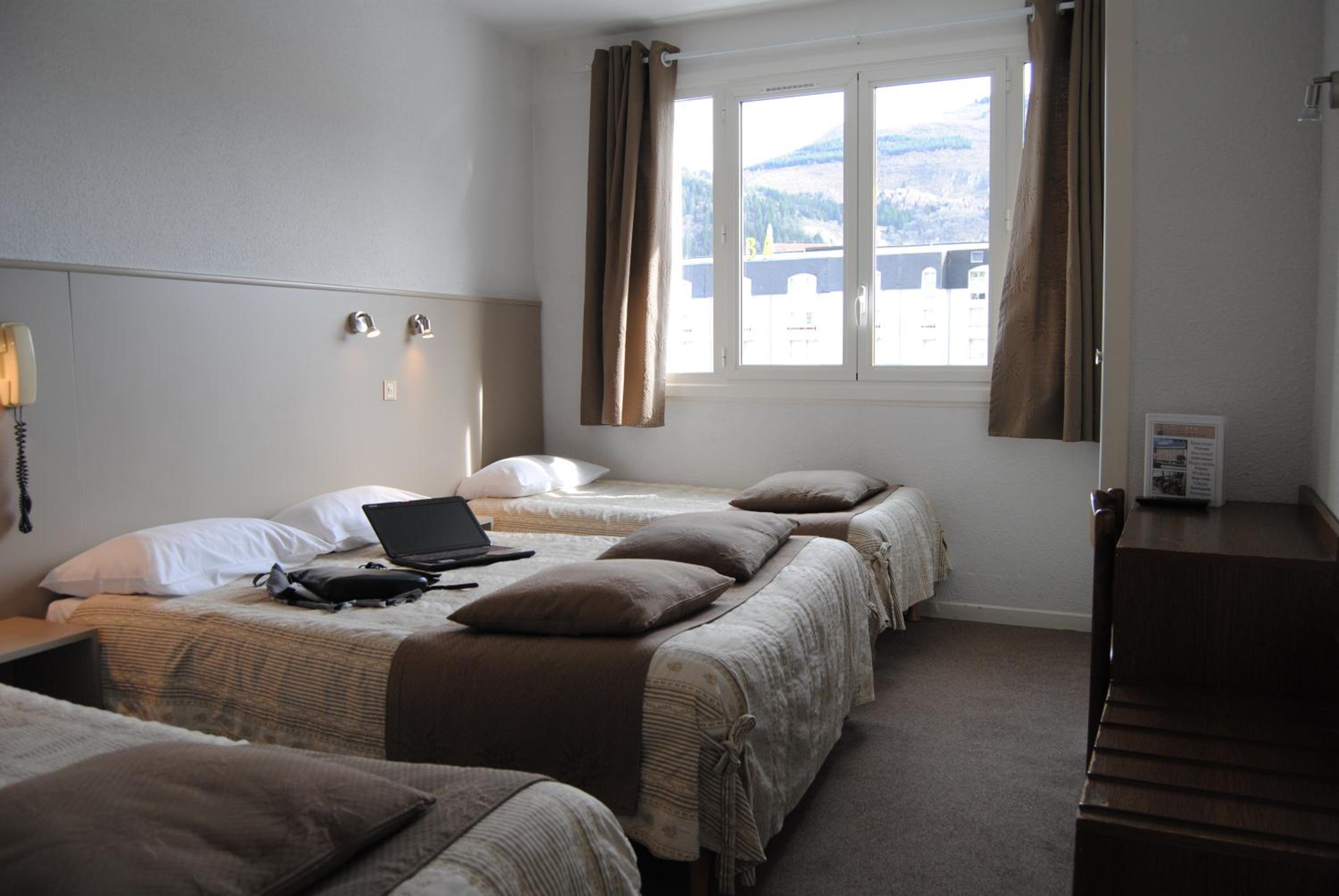 Quadruple Room (2 Adults + 2 Children)