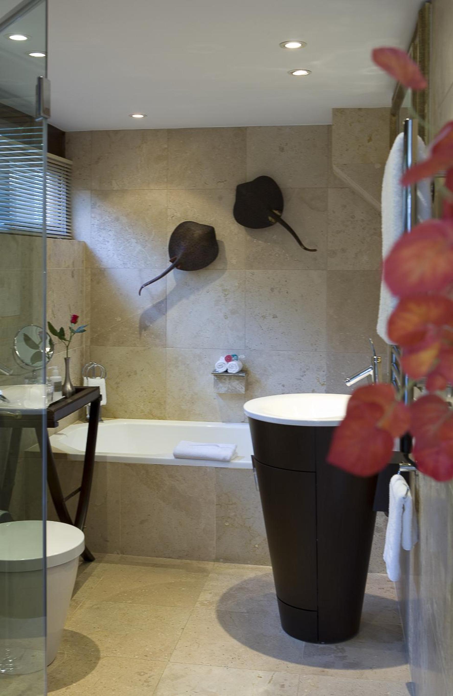 Deluxe Junior Suite with Terrace, Sea View and Mountain View (Master Bedroom)