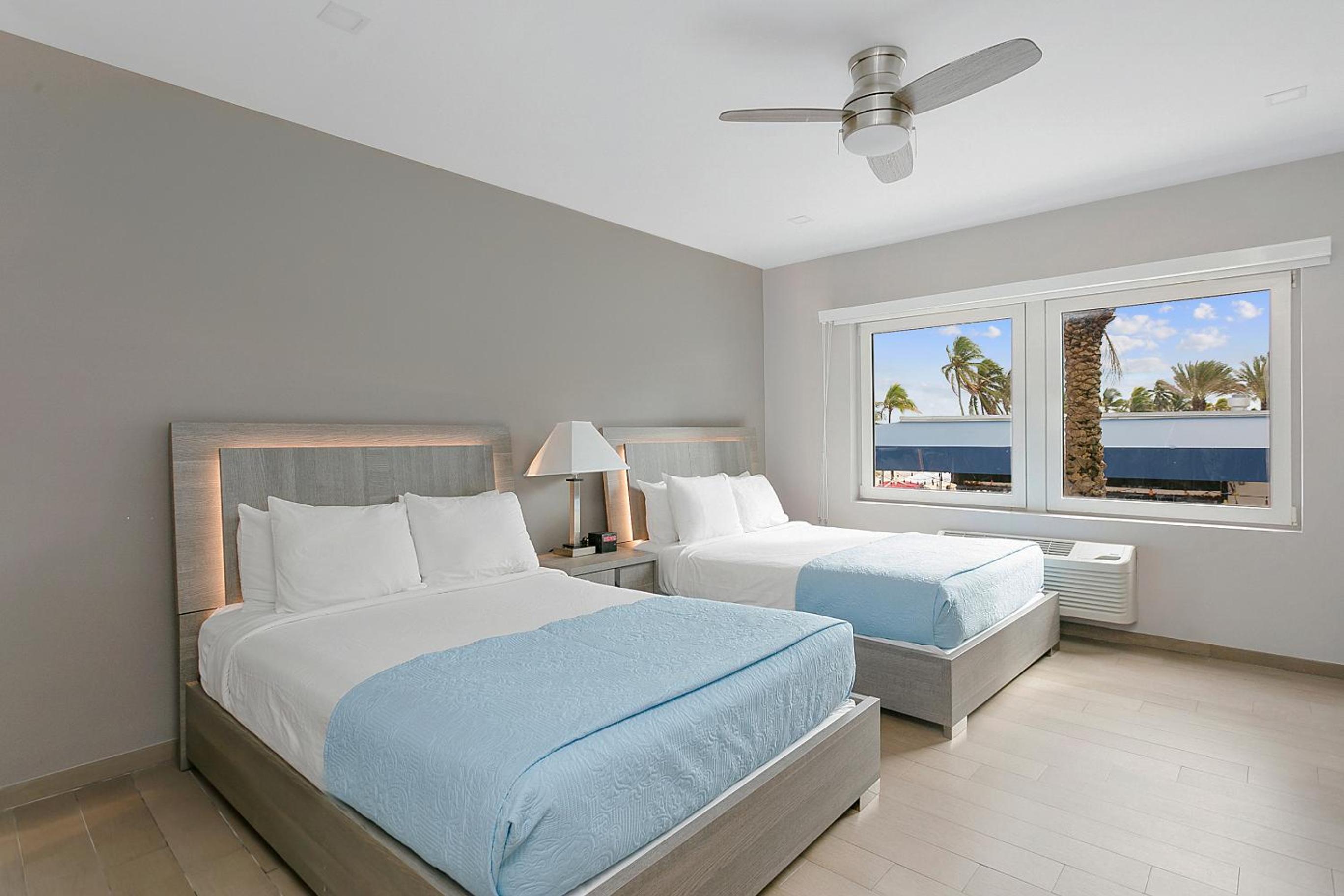 Partial Ocean View Room with Two Double Beds