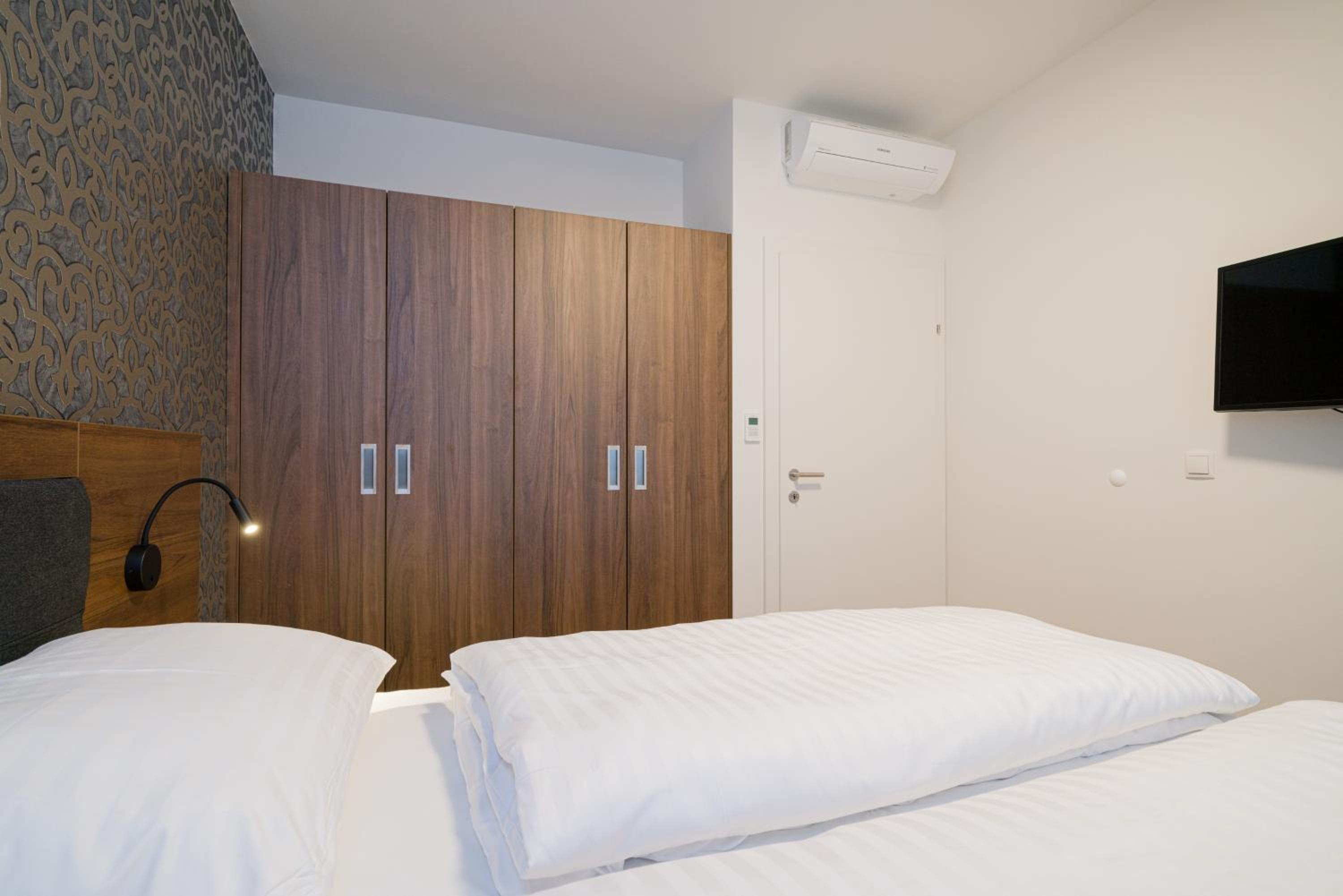 Three-Bedroom Apartment with Balcony