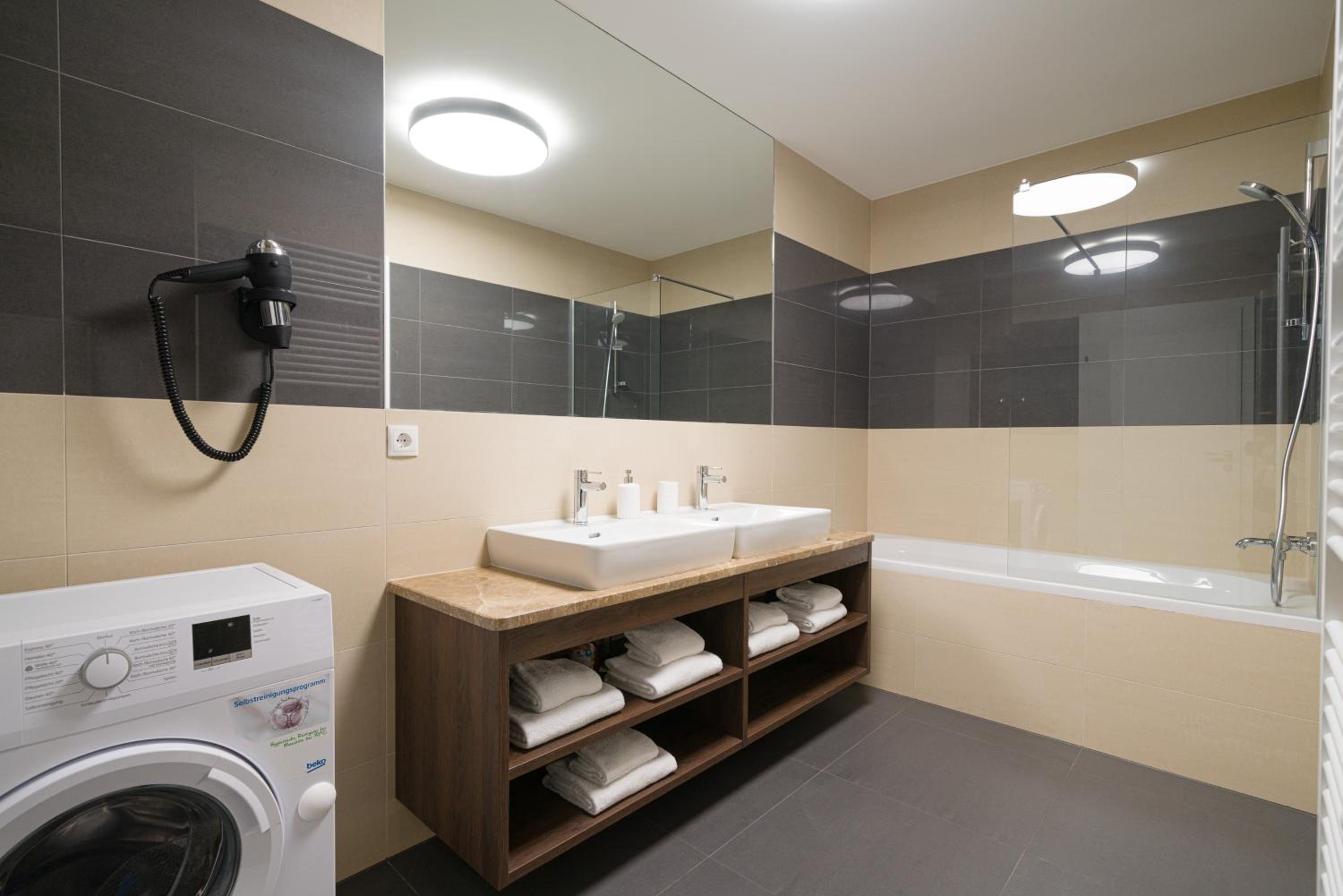 Four-Bedroom Apartment with Balcony 