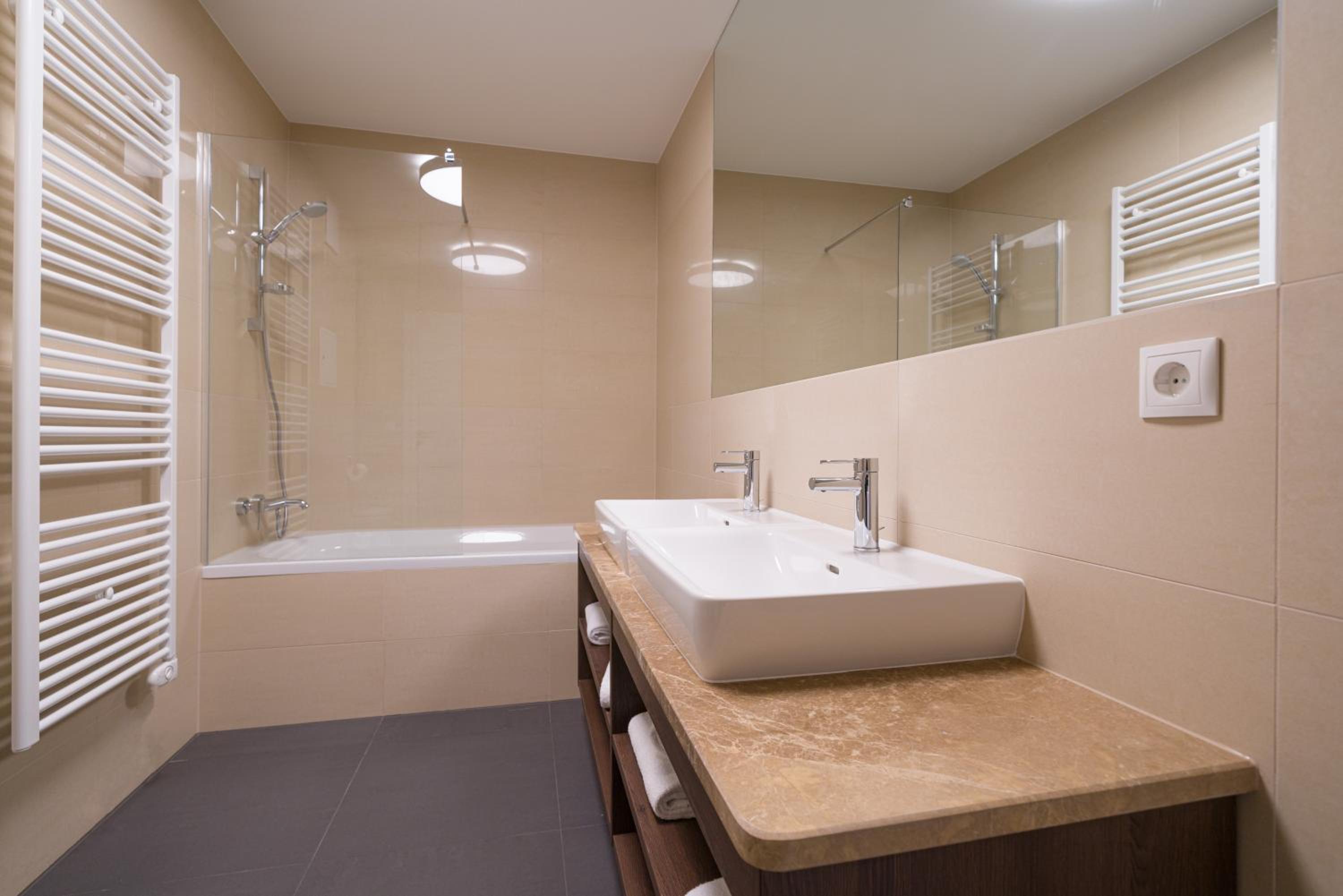 Four-Bedroom Apartment with Balcony 