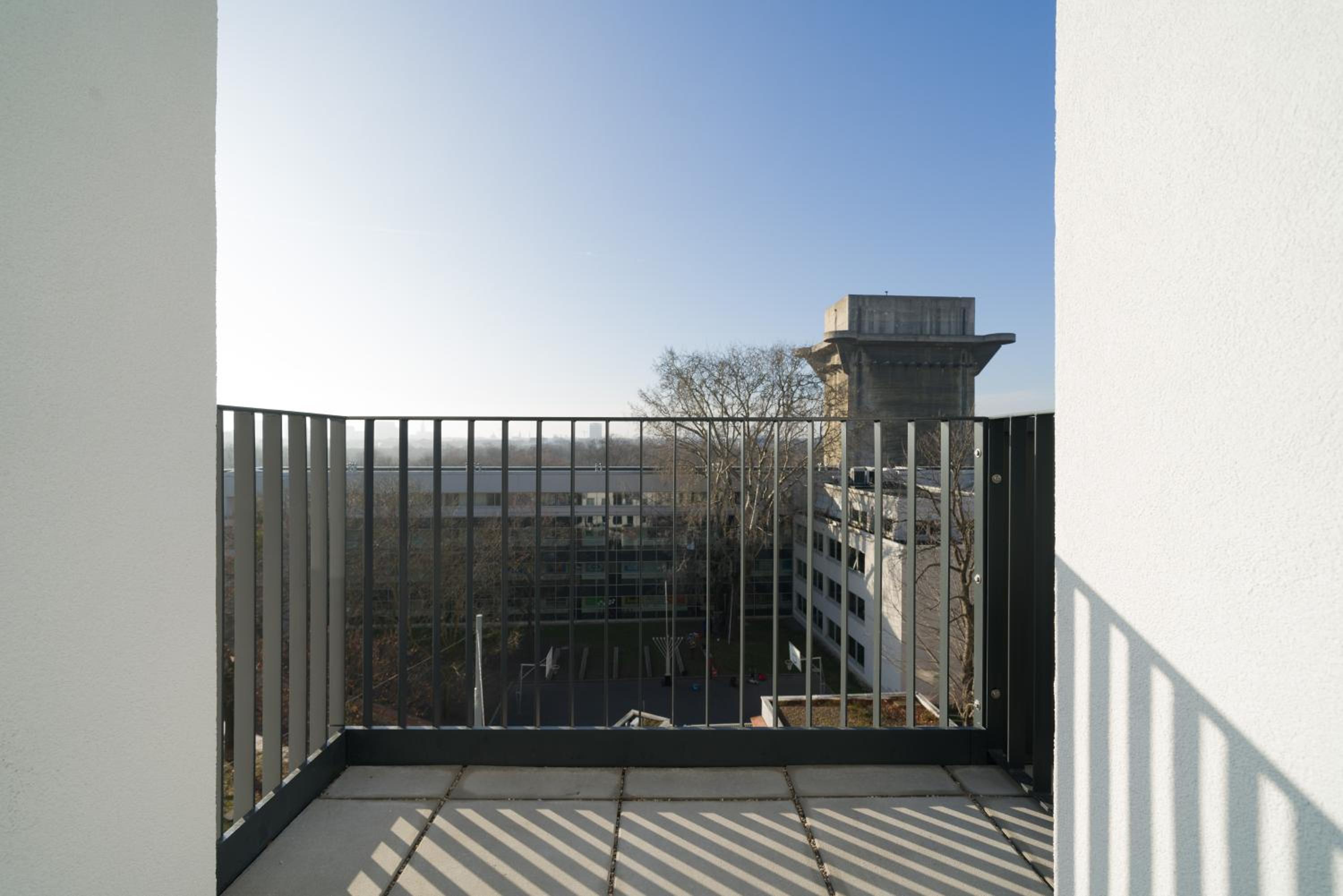 Four-Bedroom Apartment with Balcony 
