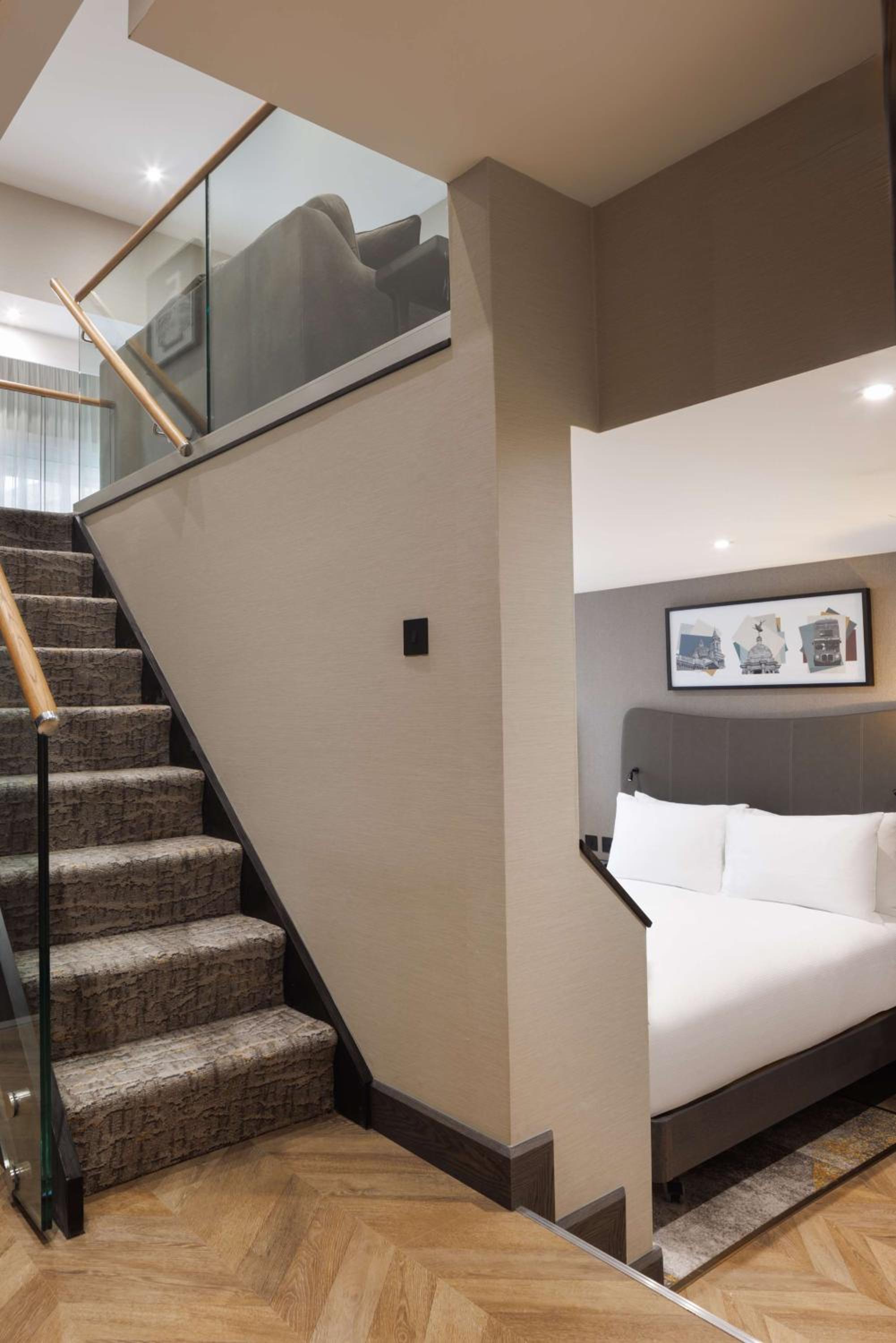 Duplex Suite with Two Double Beds and Sofa Bed