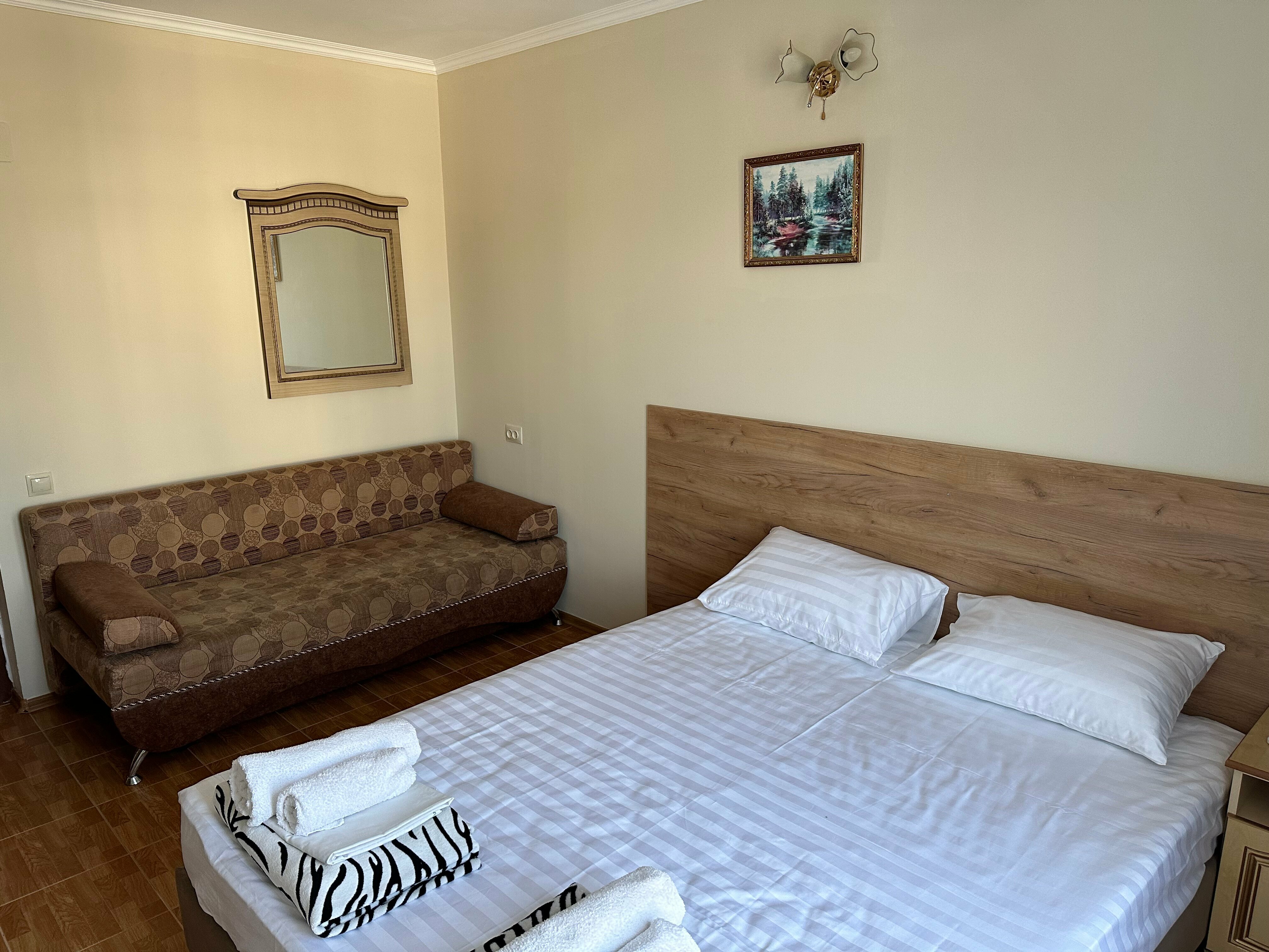 Трехместный номер с балконом