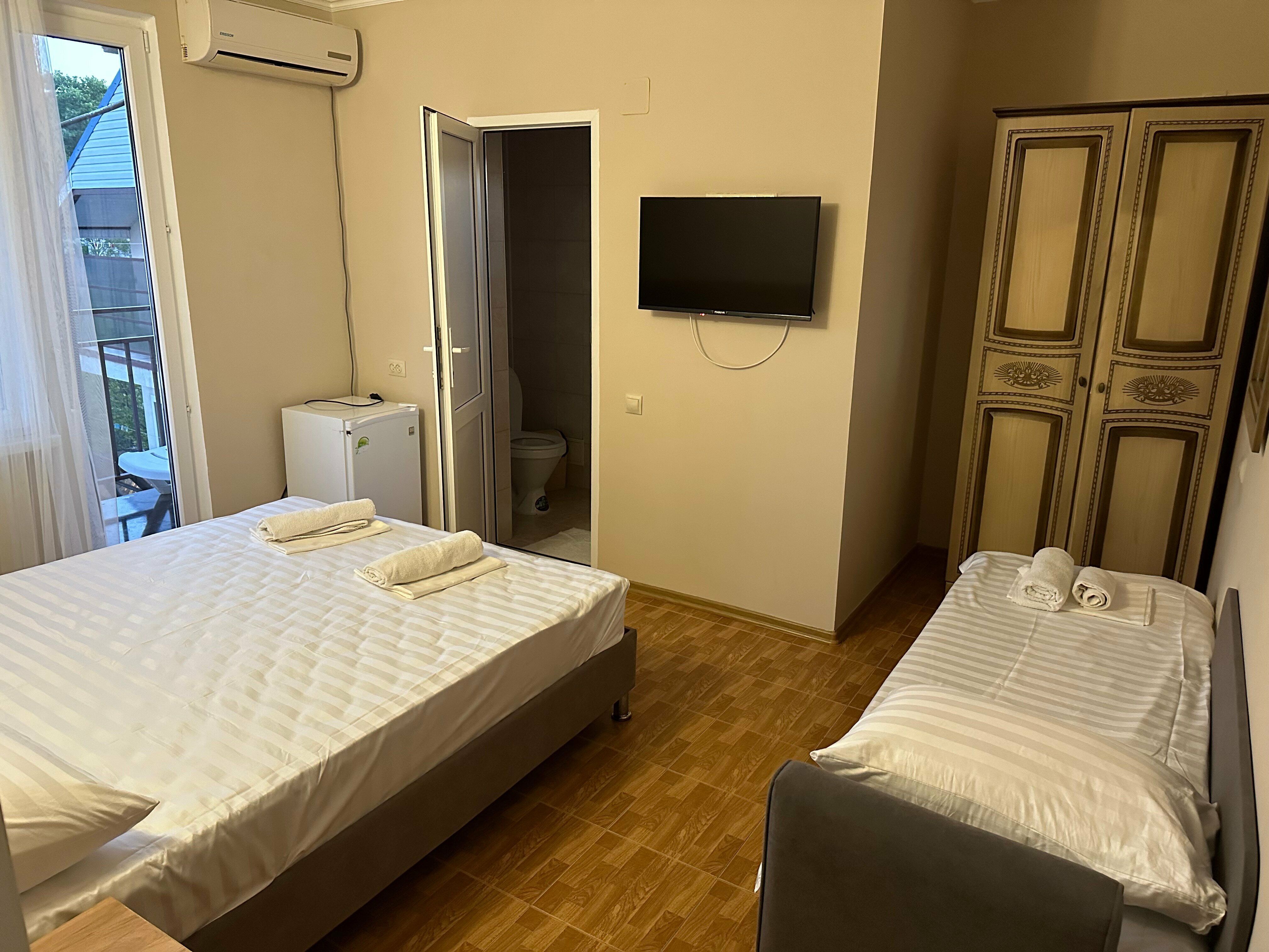 Трехместный номер с балконом