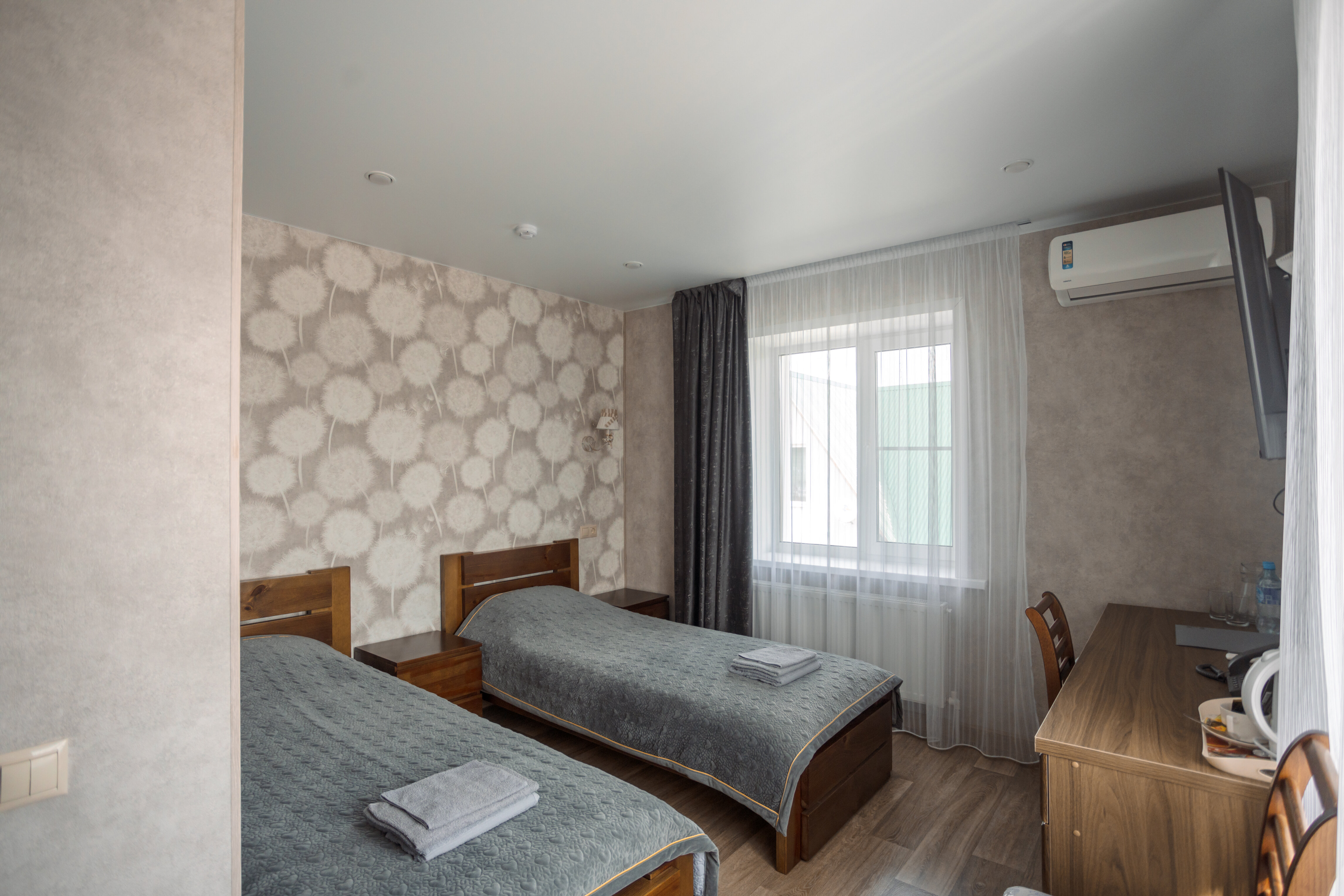 Двухместный номер с 2 отдельными кроватями и душем