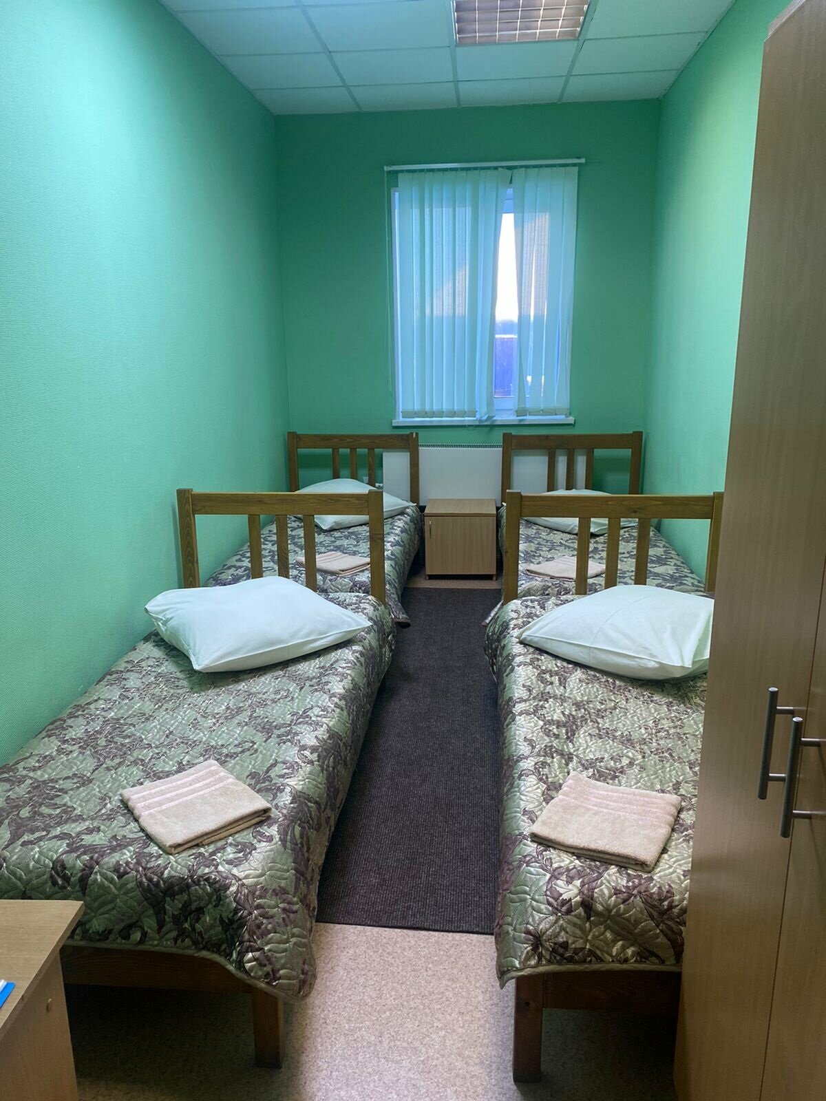 Кровать в общем номере с 4 кроватями