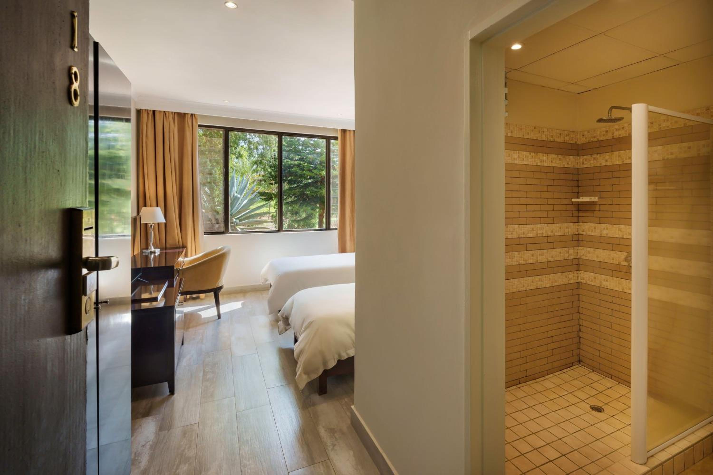 Guest Room with Twin Beds and Mountain View