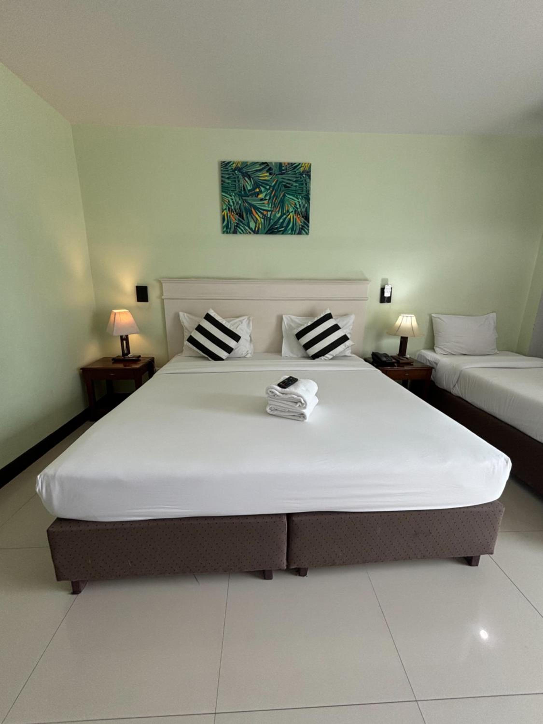 Standard Triple Room with Balcony
