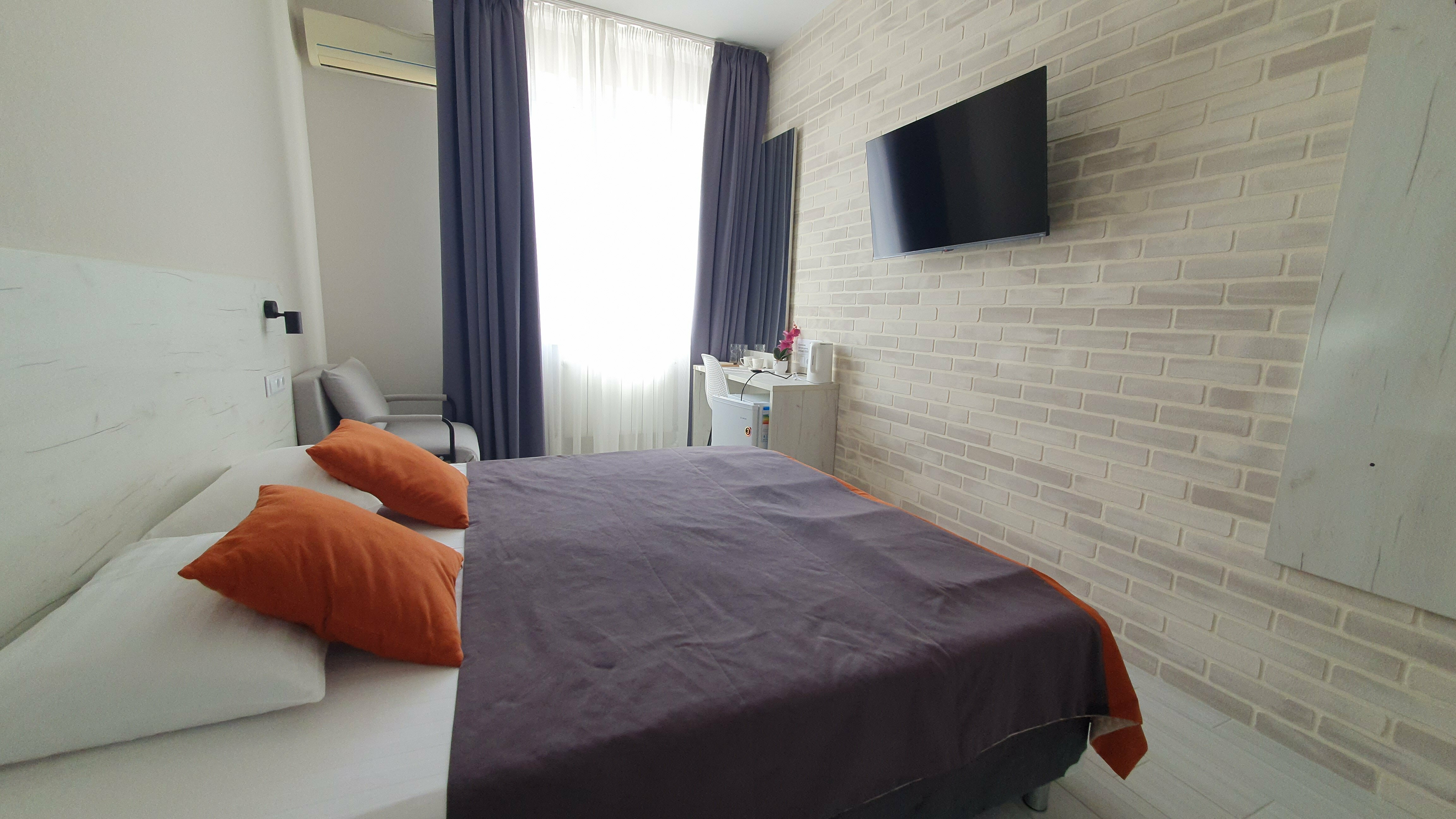 Улучшенный двухместный номер с 2 отдельными кроватями