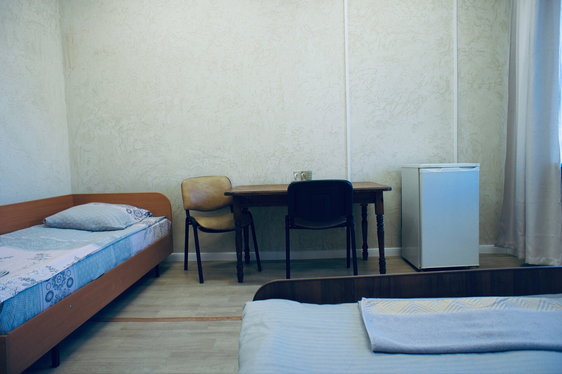 Трехместный номер с общей ванной комнатой