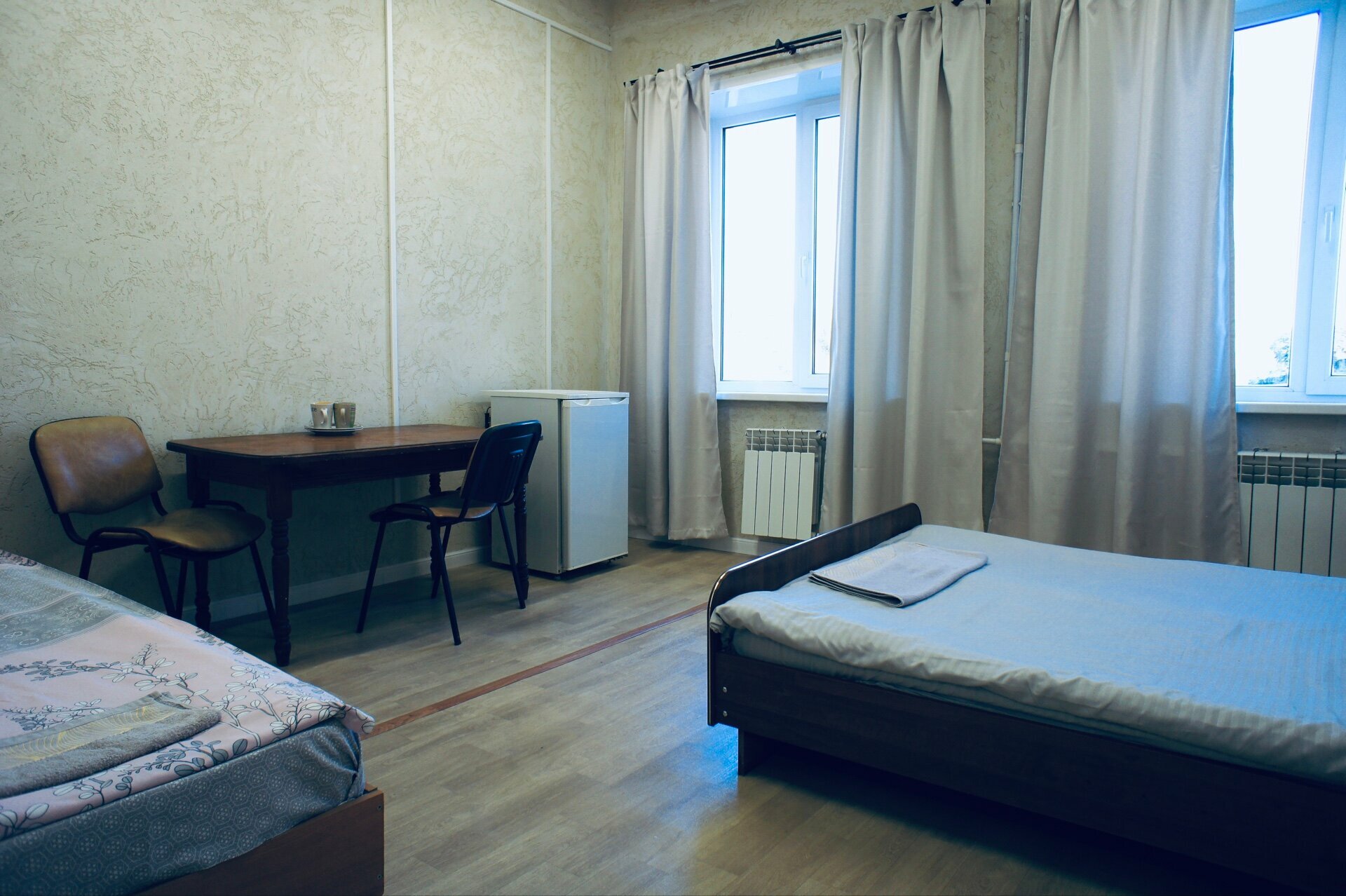 Трехместный номер с общей ванной комнатой