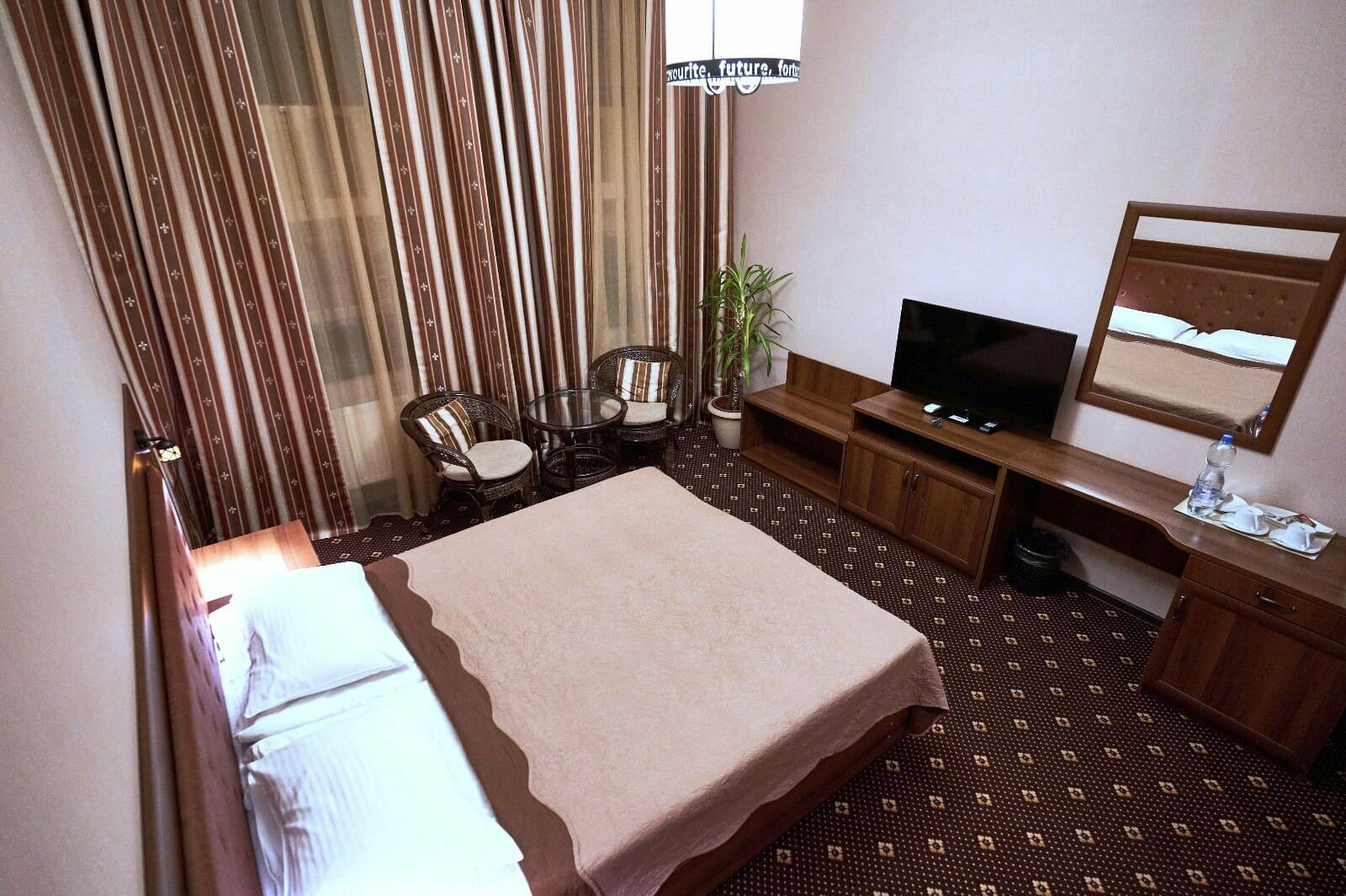 Улучшенный двухместный номер с одной двуспальной или двумя односпальными кроватями