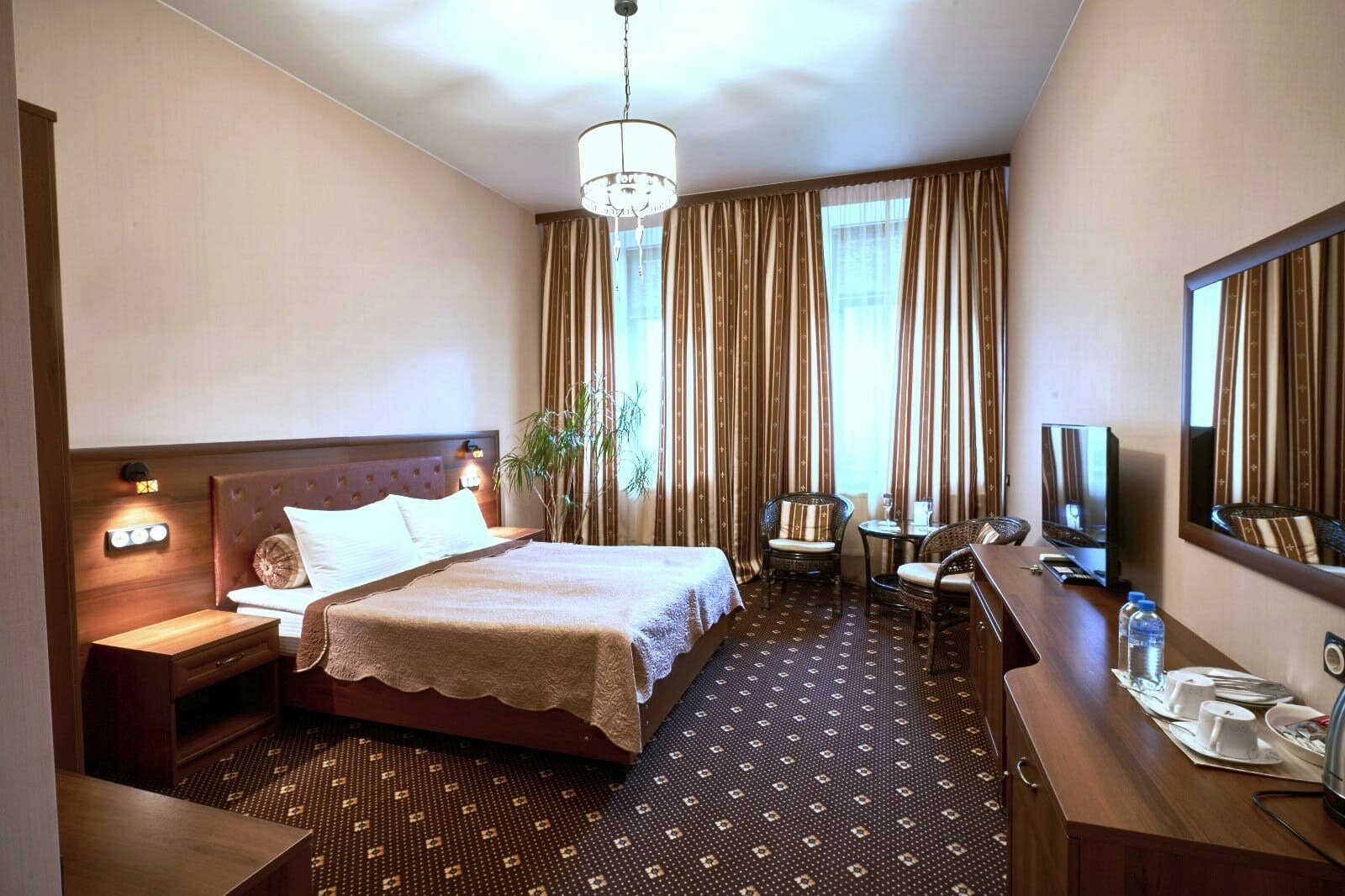 Улучшенный двухместный номер с одной двуспальной или двумя односпальными кроватями