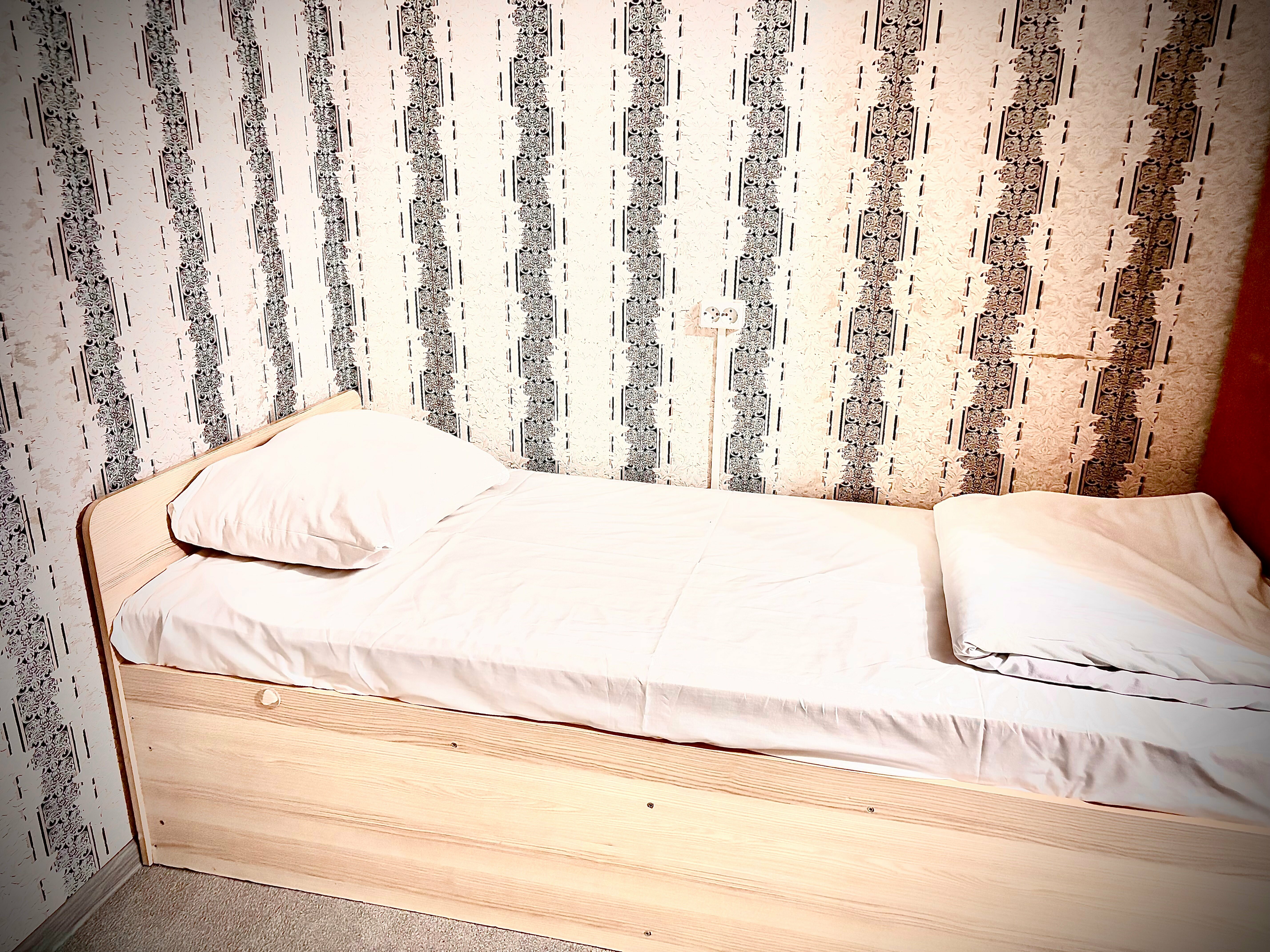 Кровать в общем 4-местном номере для мужчин и женщин