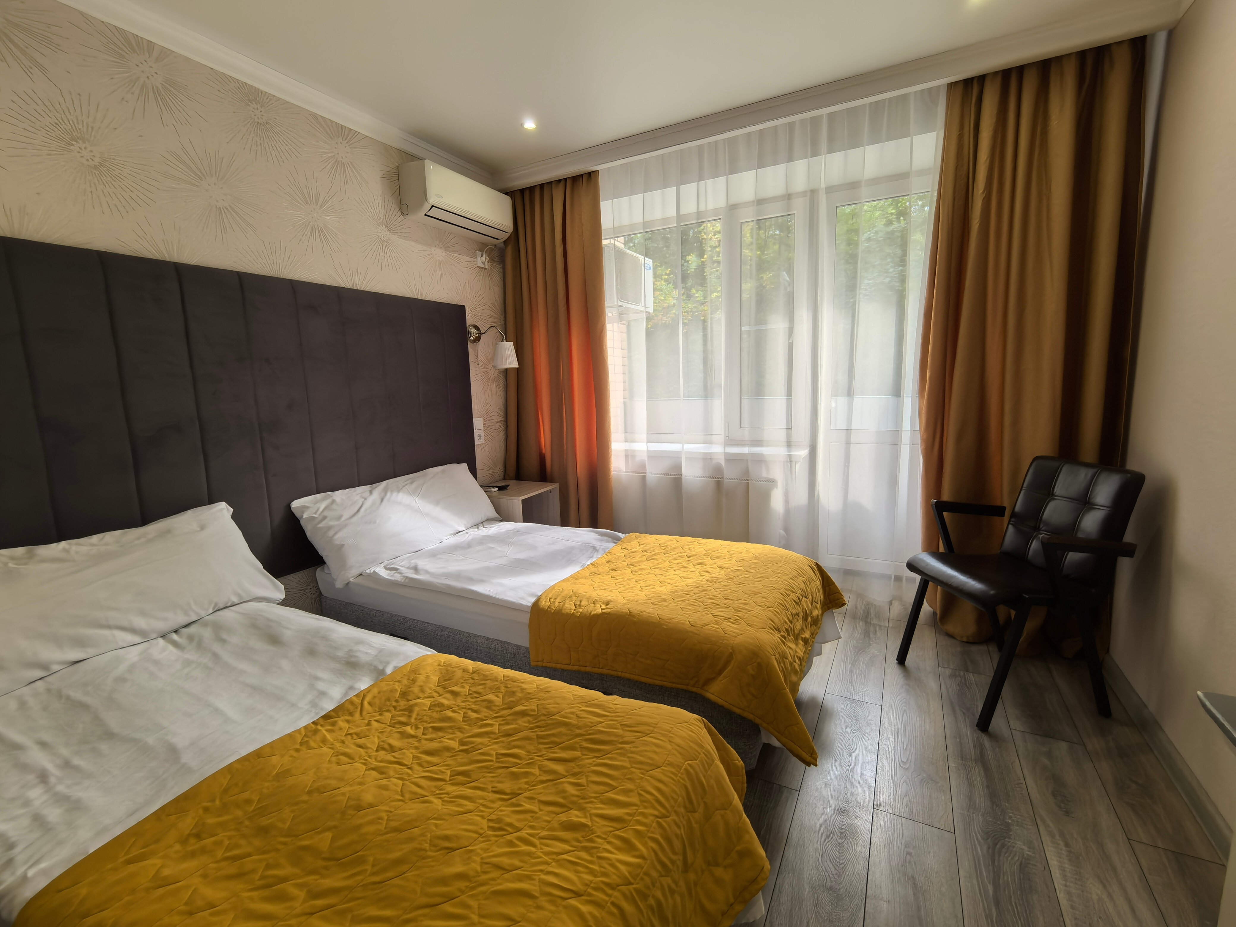 Двухместный номер с 2 отдельными кроватями и балконом