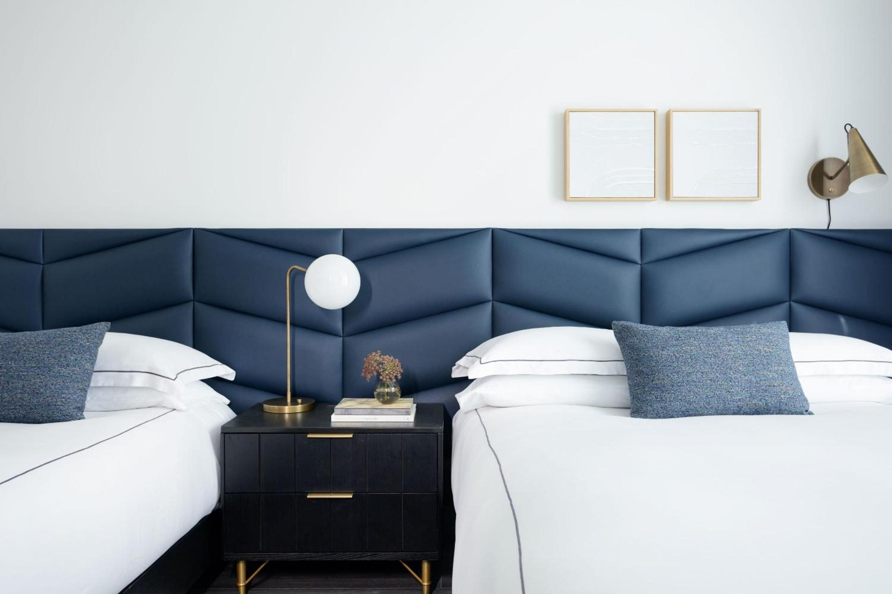 Essential Queen Room with Two Queen Beds and City View