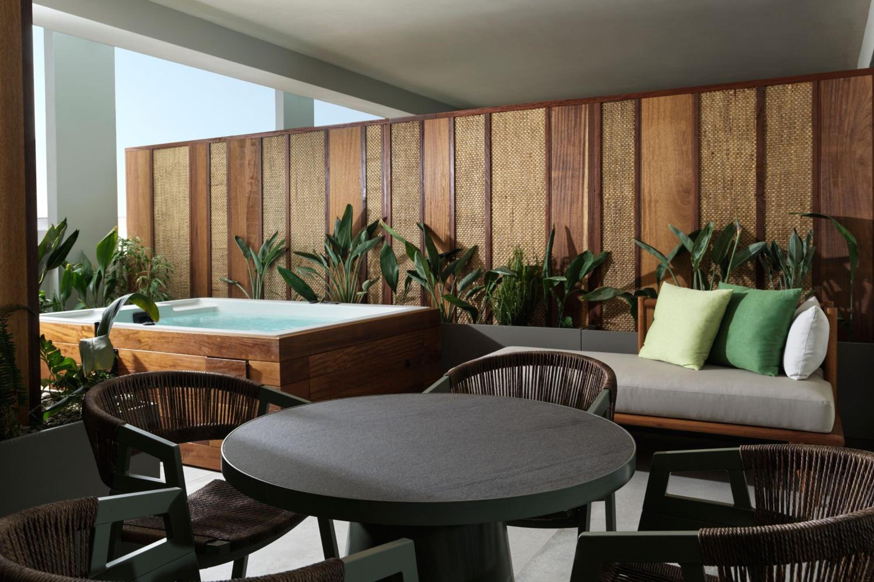 Junior Suite with Balcony and Garden View