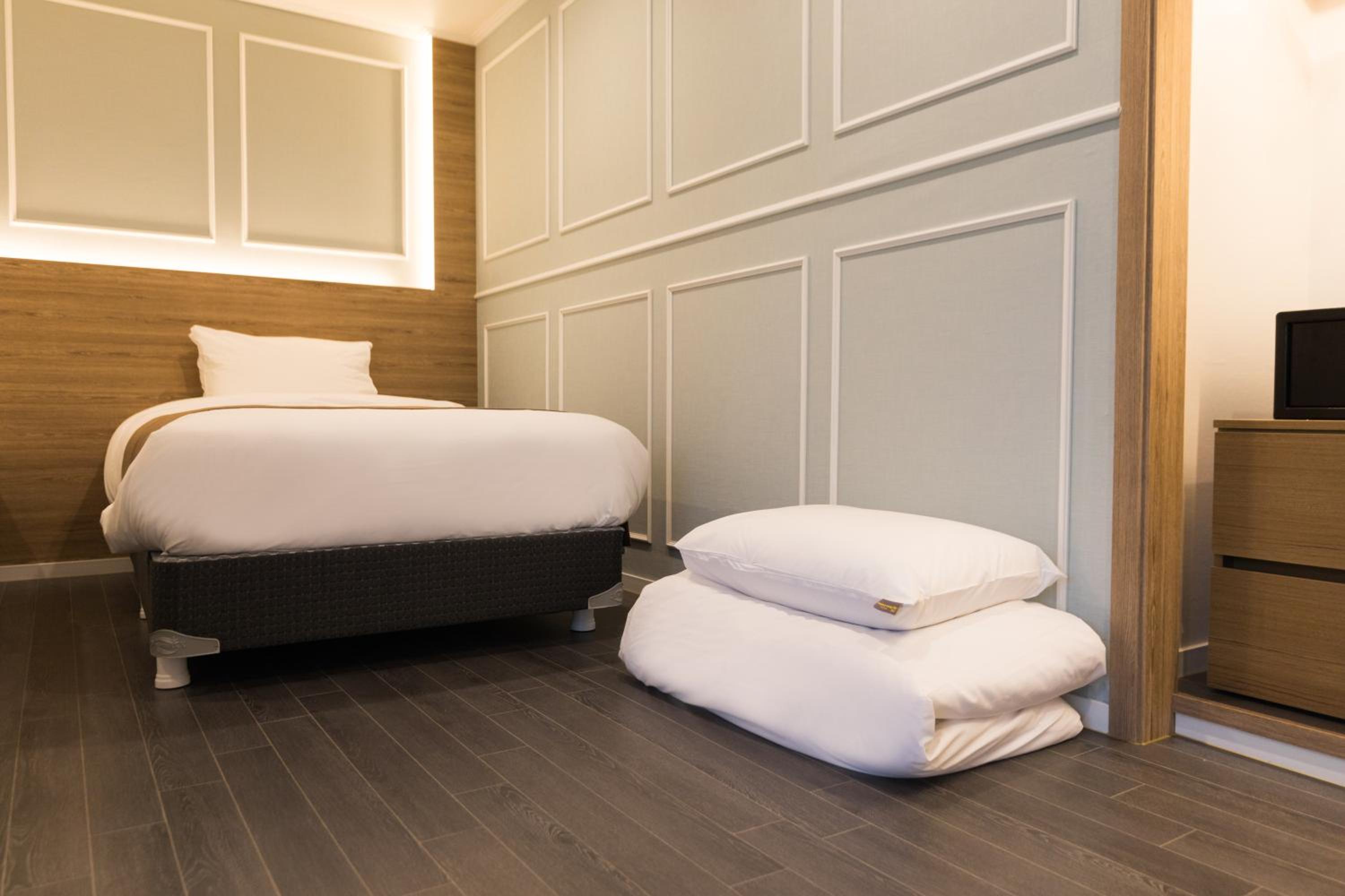 Family Quad Room with City View