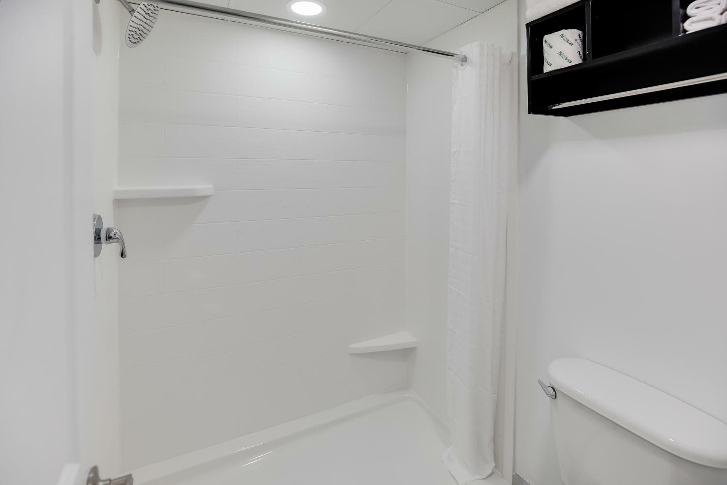 Queen Room with 2 queen beds, nonsmoking with partial ocean view, side view