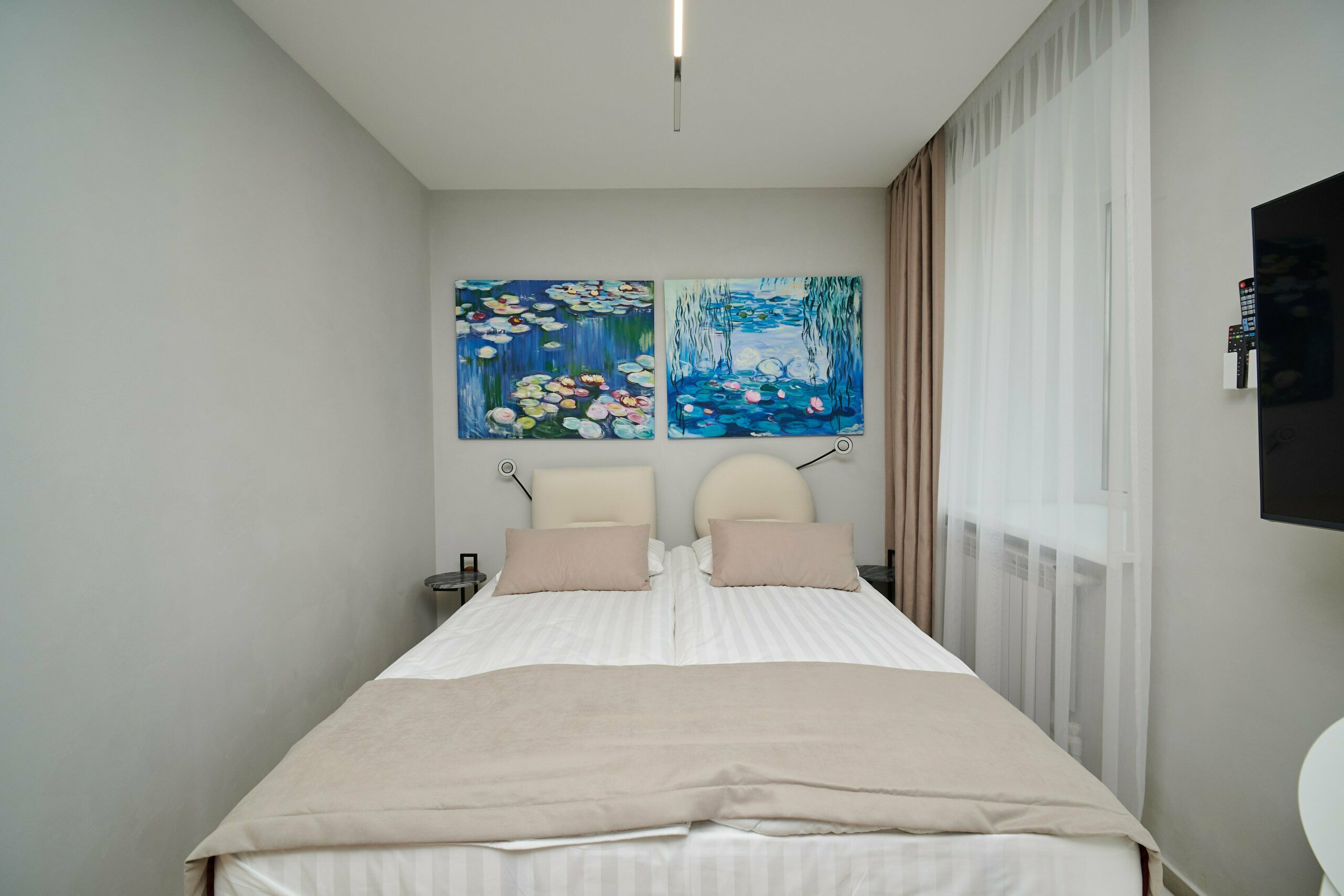 Двухместный номер  "Моне" с дополнительным спальным местом (кресло-кровать)