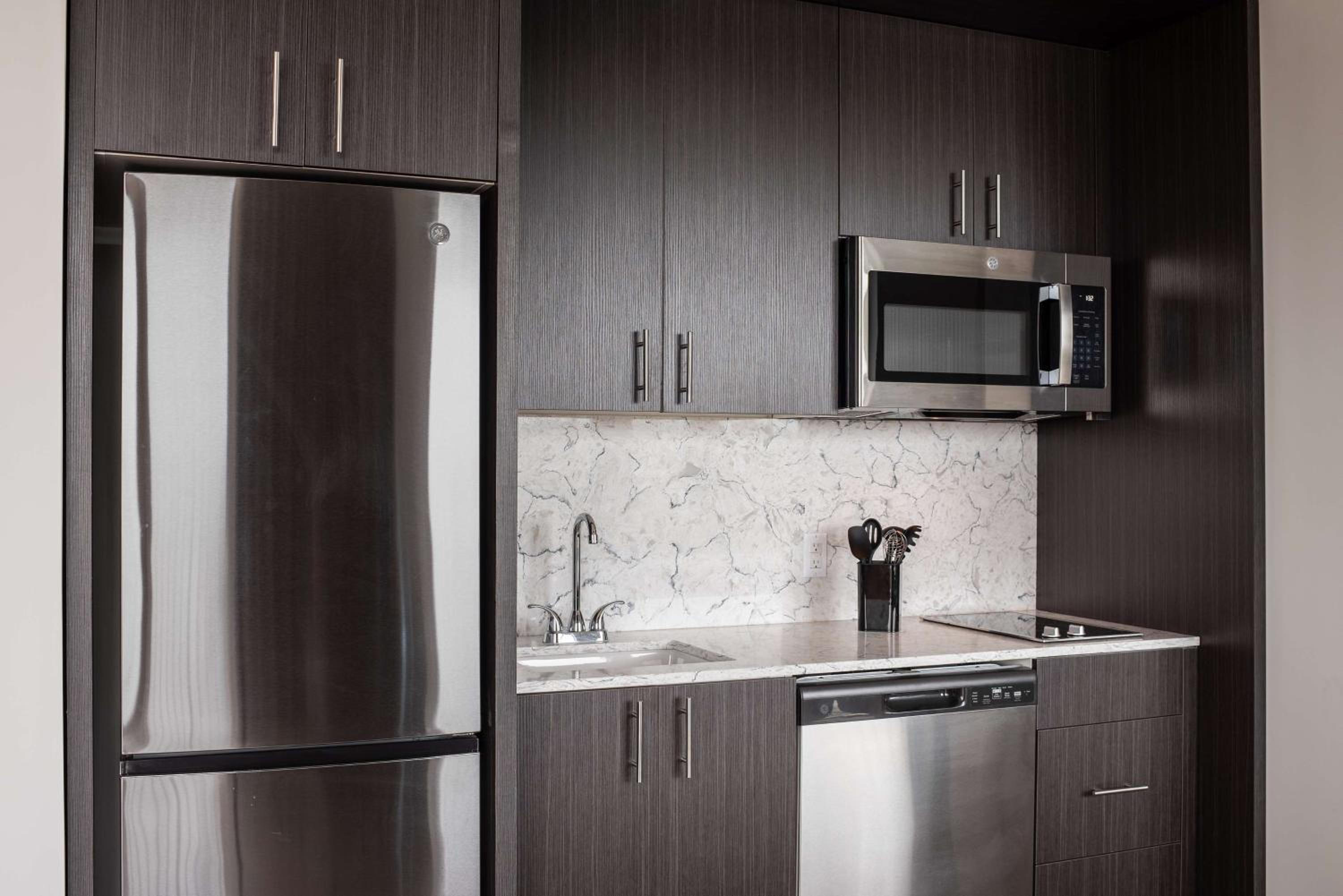 Corner Queen Studio Suite with Balcony