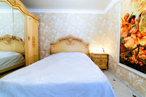 Улучшенный четырехместный номер в Уют