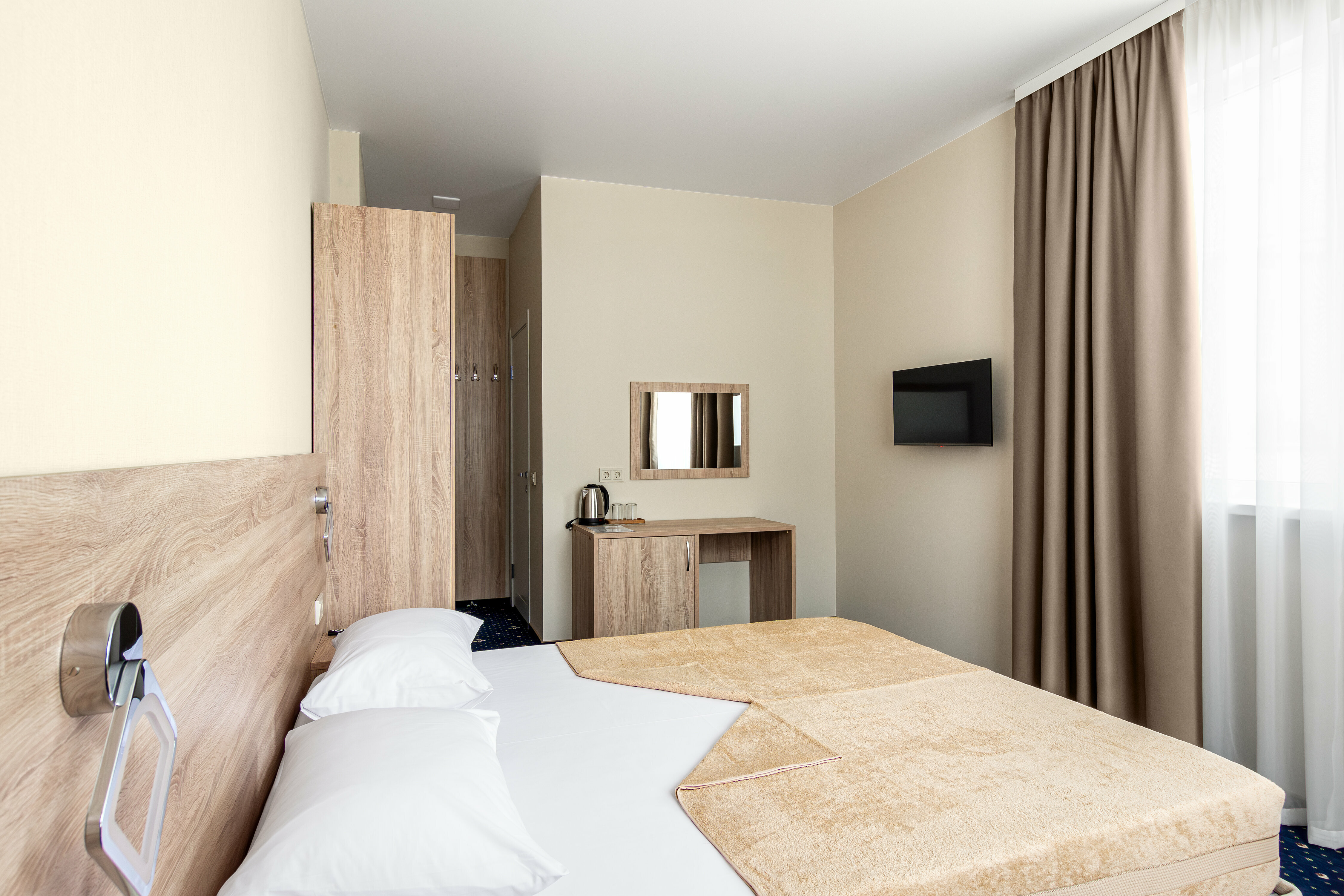 Улучшенный номер с кроватью размера «queen-size»