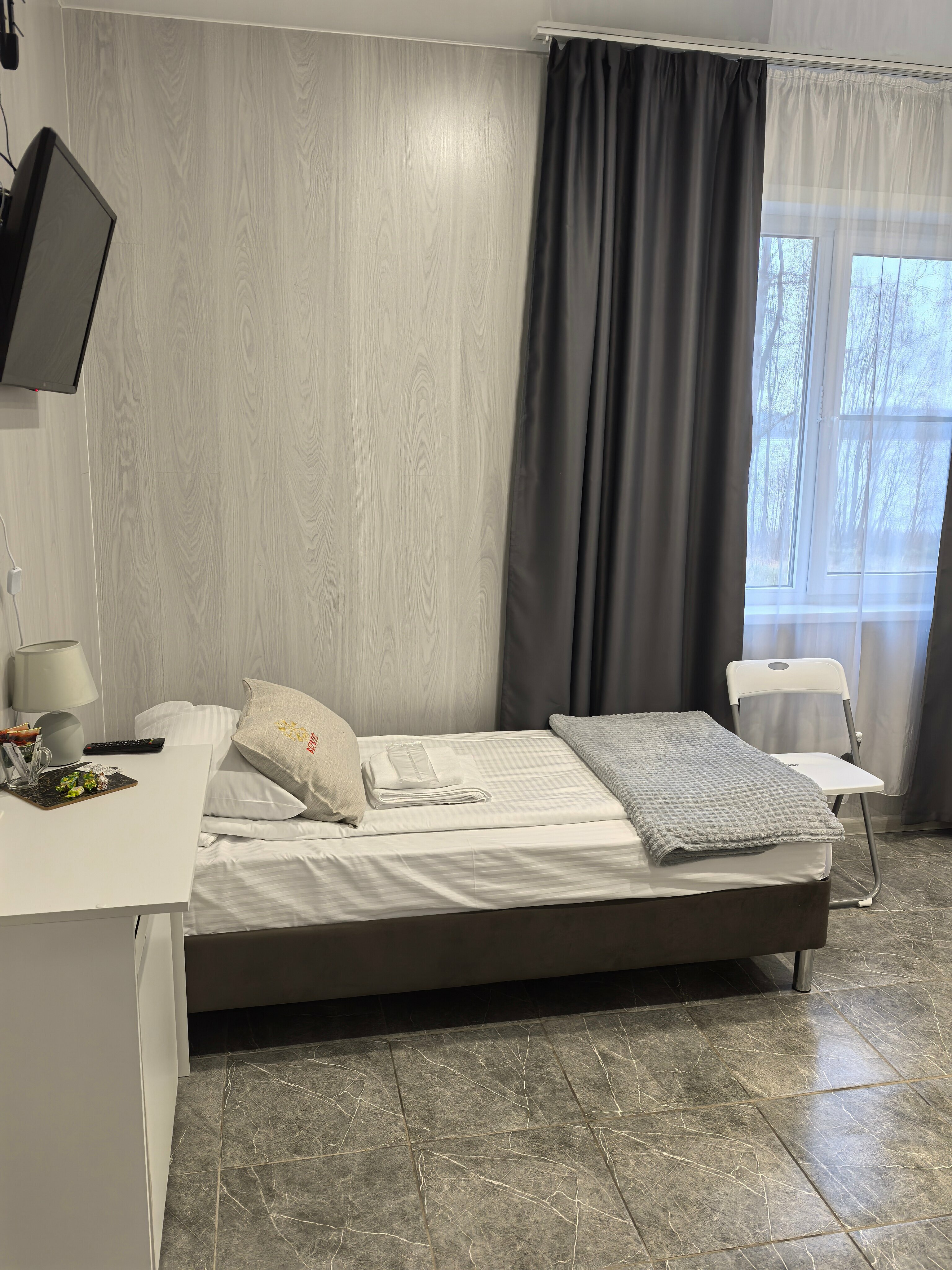 Трехместный номер с основными удобствами